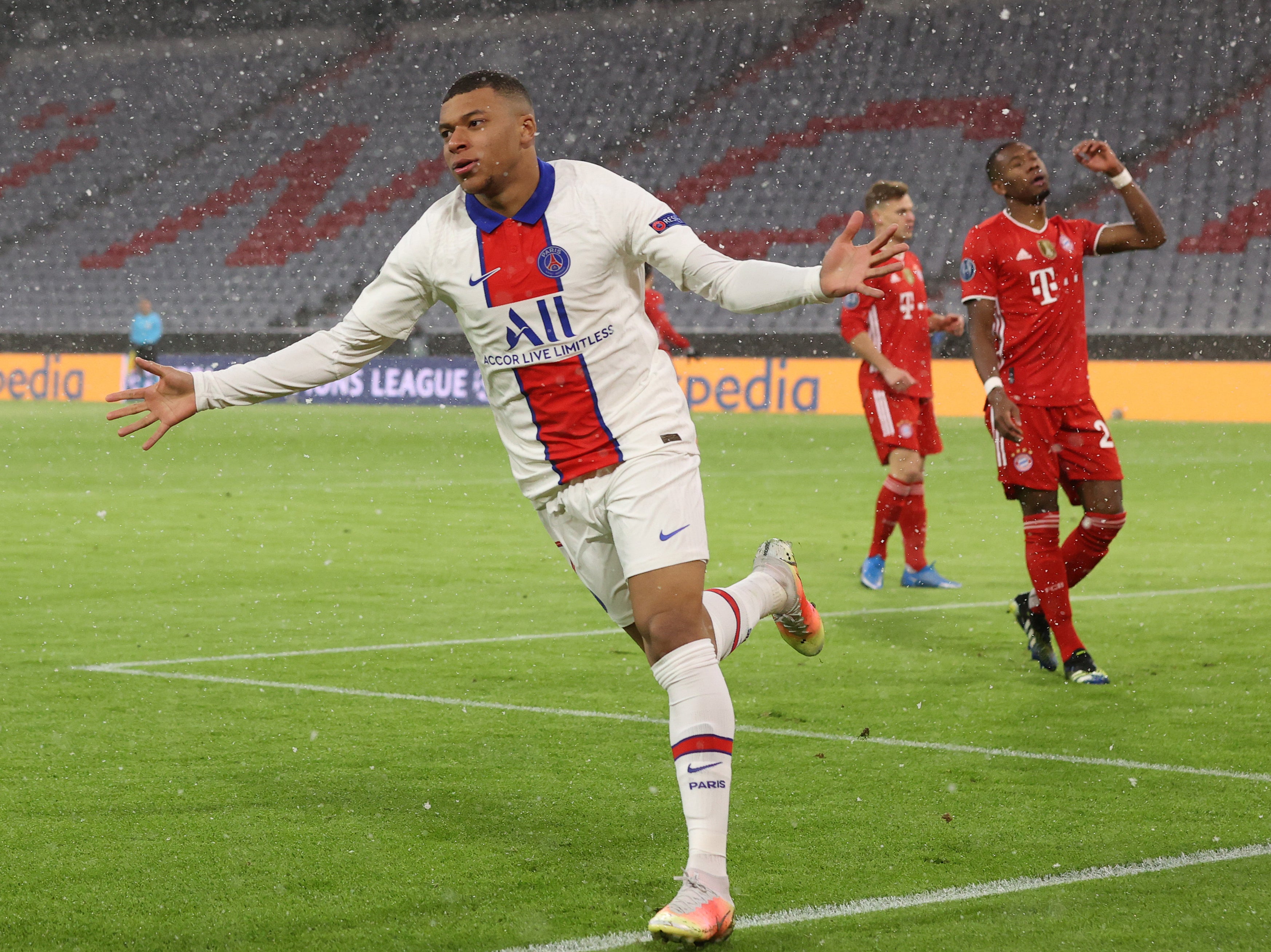 Kylian Mbappe of Paris Saint-Germain celebrates at Bayern Munich