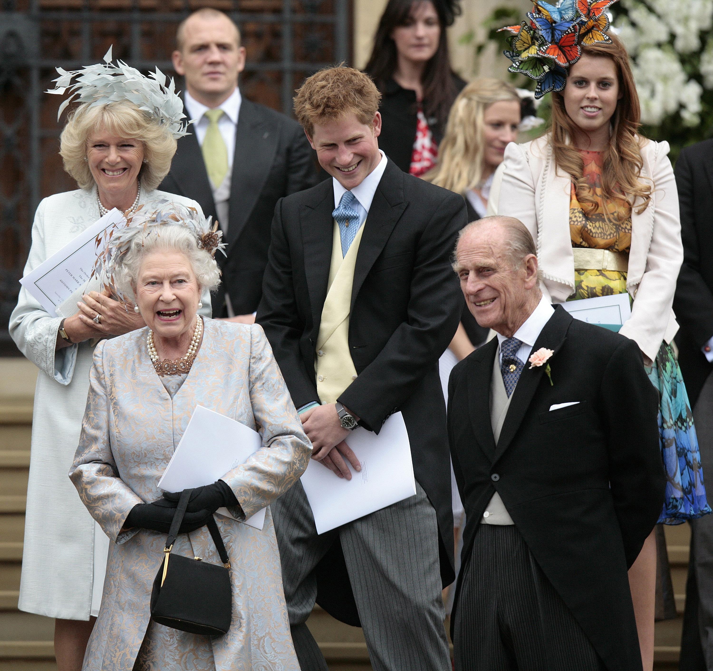 Members of Britains royal family leave the St George's Chapel in Windsor after attending the marriage ceromany of Mr Peter Phillips and Miss Autumn Kelly (PA)