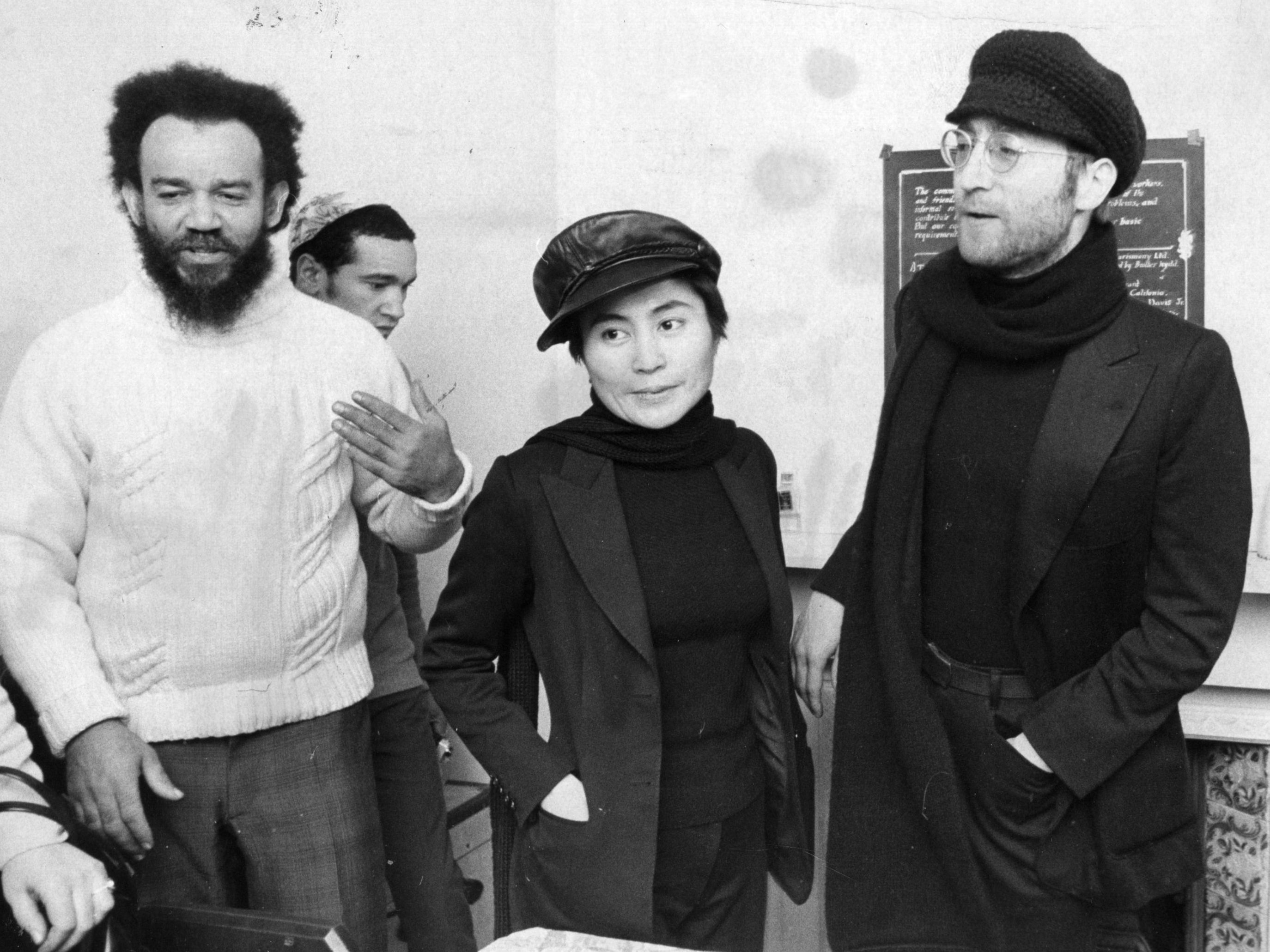 John Lennon and Yoko Ono with Black Power leader Michael X at his house in Holloway