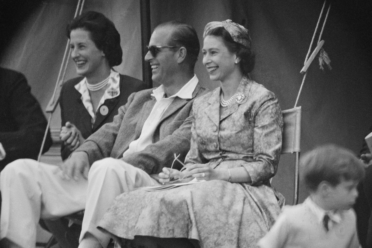 Queen Elizabeth II and Prince Philip, Duke of Edinburgh watch a cricket match at Highclere Castle, Highclere, Hampshire, 3rd August 1958