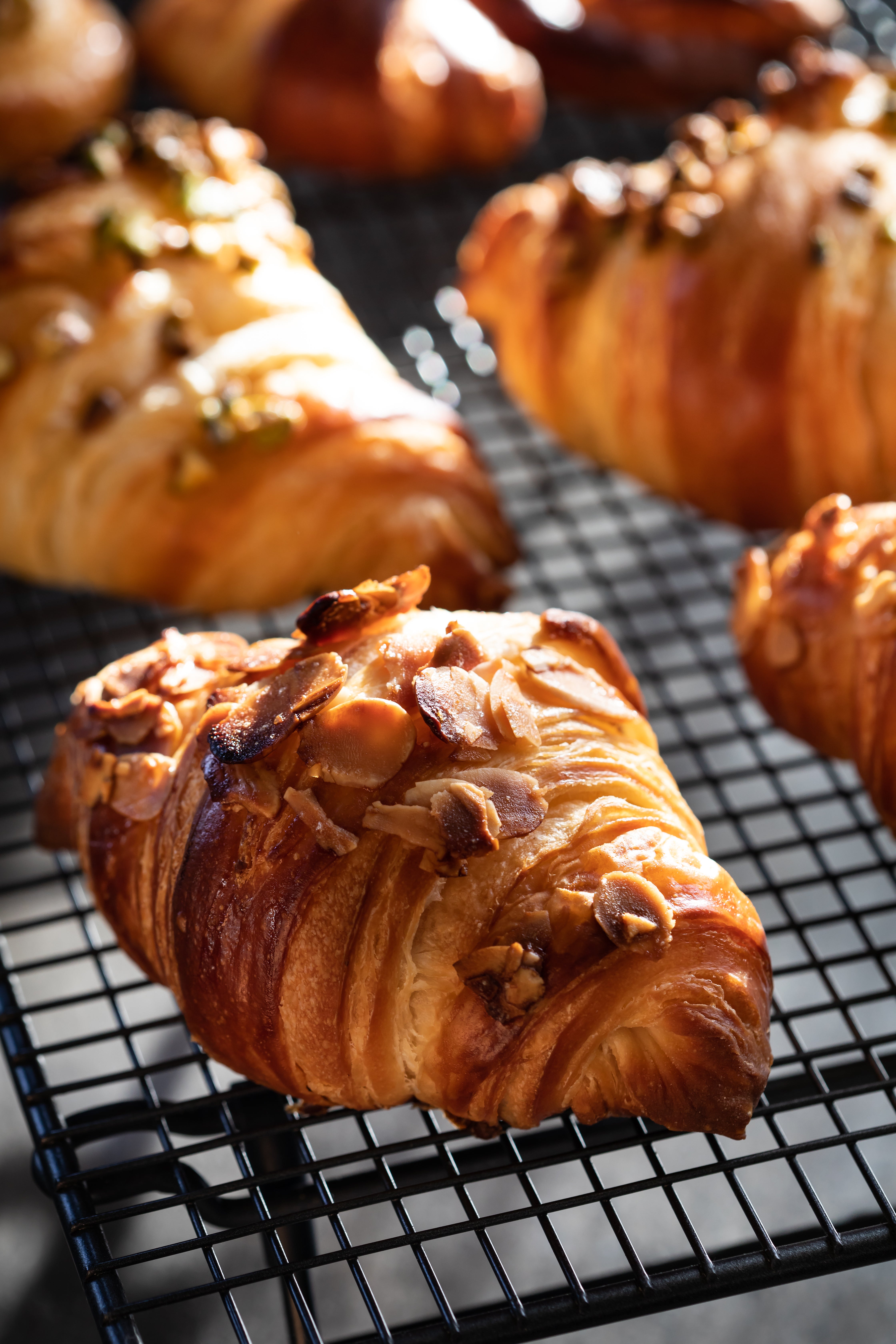 Repurpose leftover croissants with just a bit of rum simple syrup and toasted almond cream