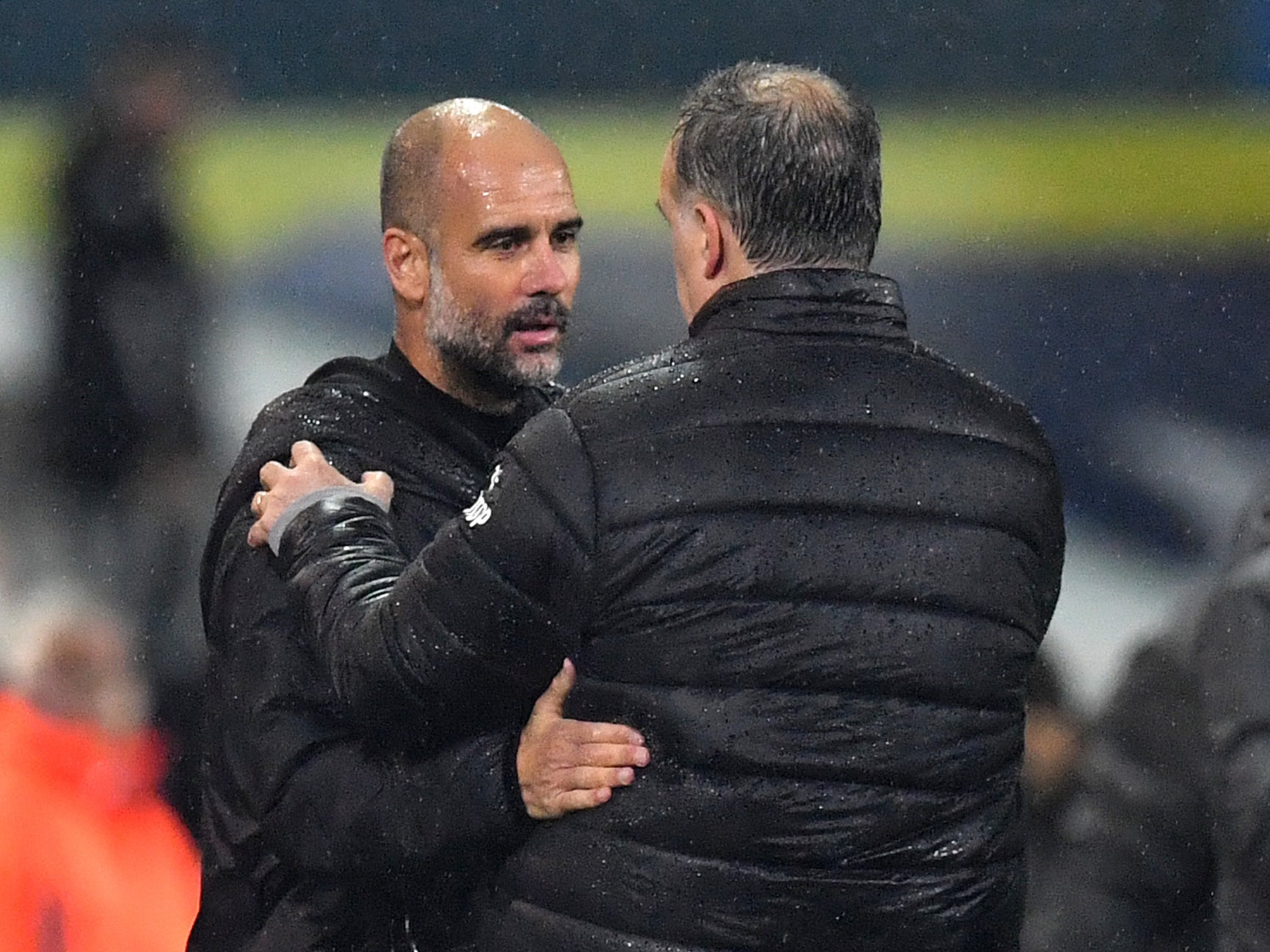 Pep Guardiola and Marcelo Bielsa embrace at Elland Road