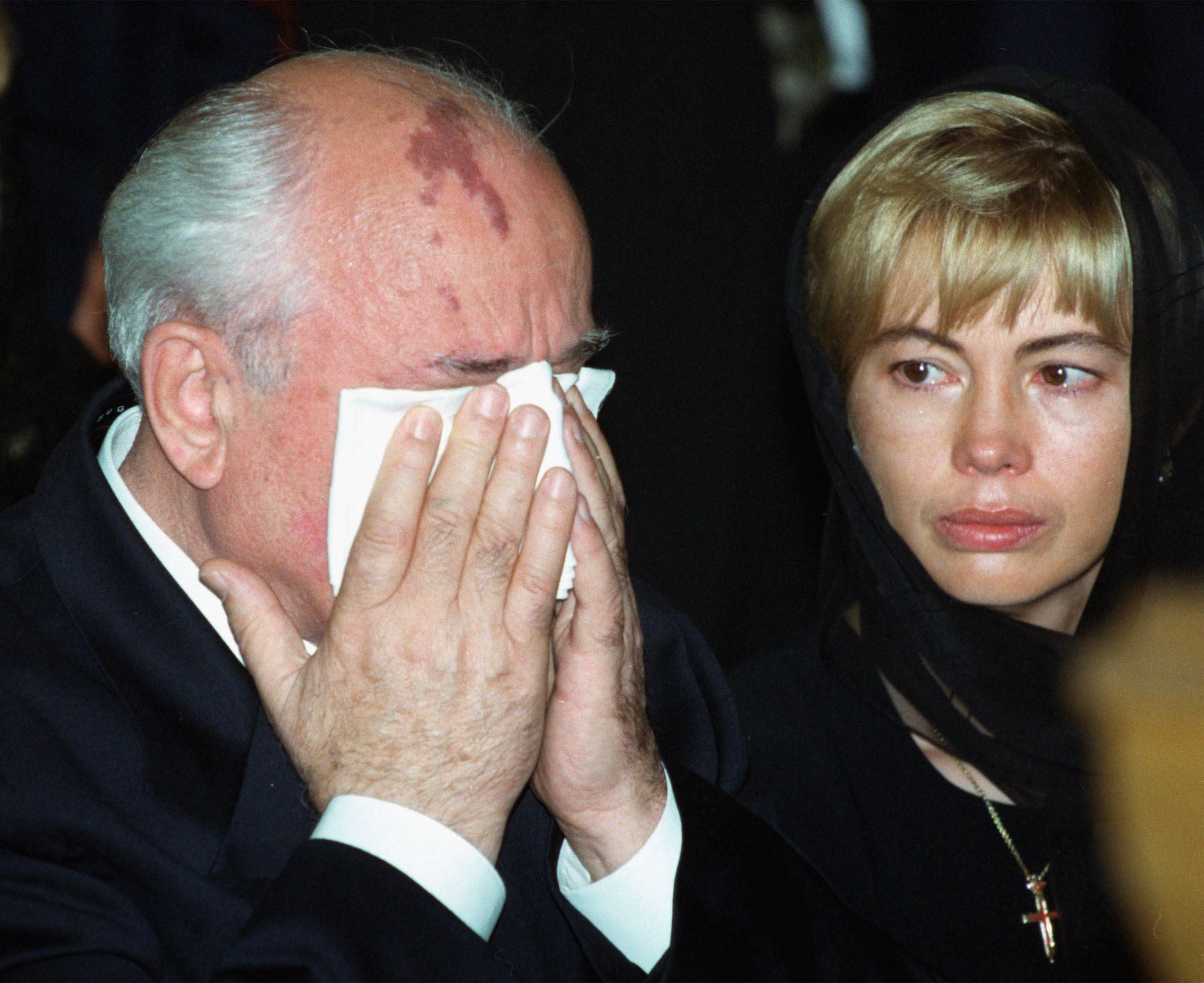 Mikhail Gorbachev wipes tears as his daughter Irina looks at him during a ceremony of paying last respects to Raisa Gorbachev