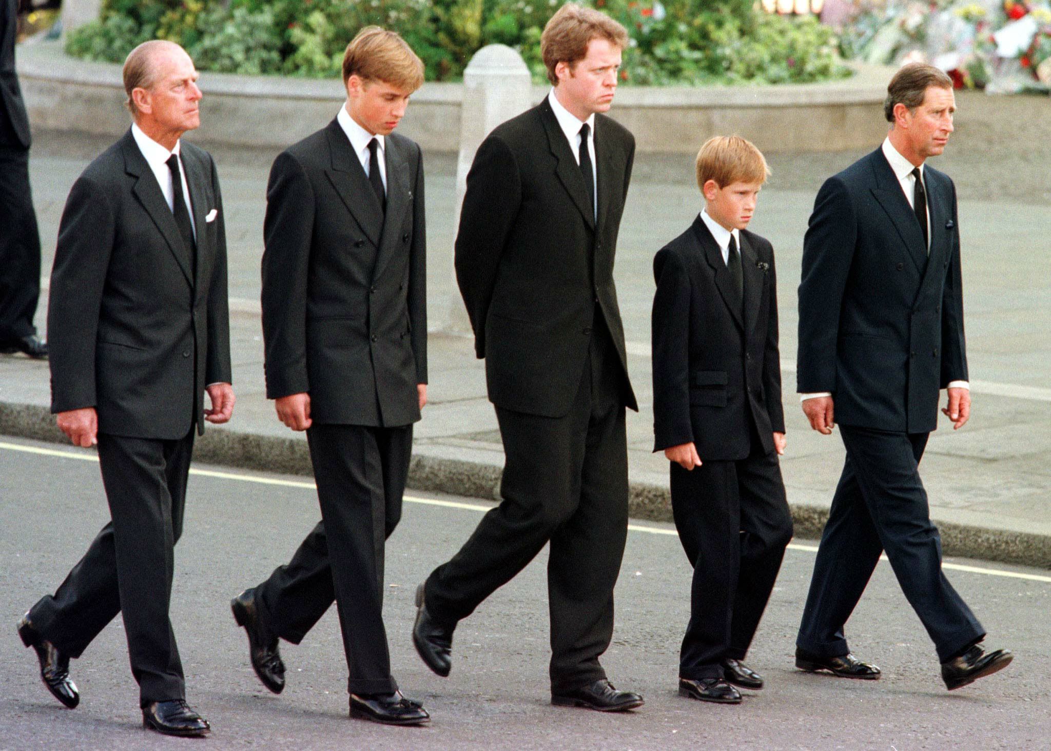 The duke with his grandsons at Diana’s funeral in 1997