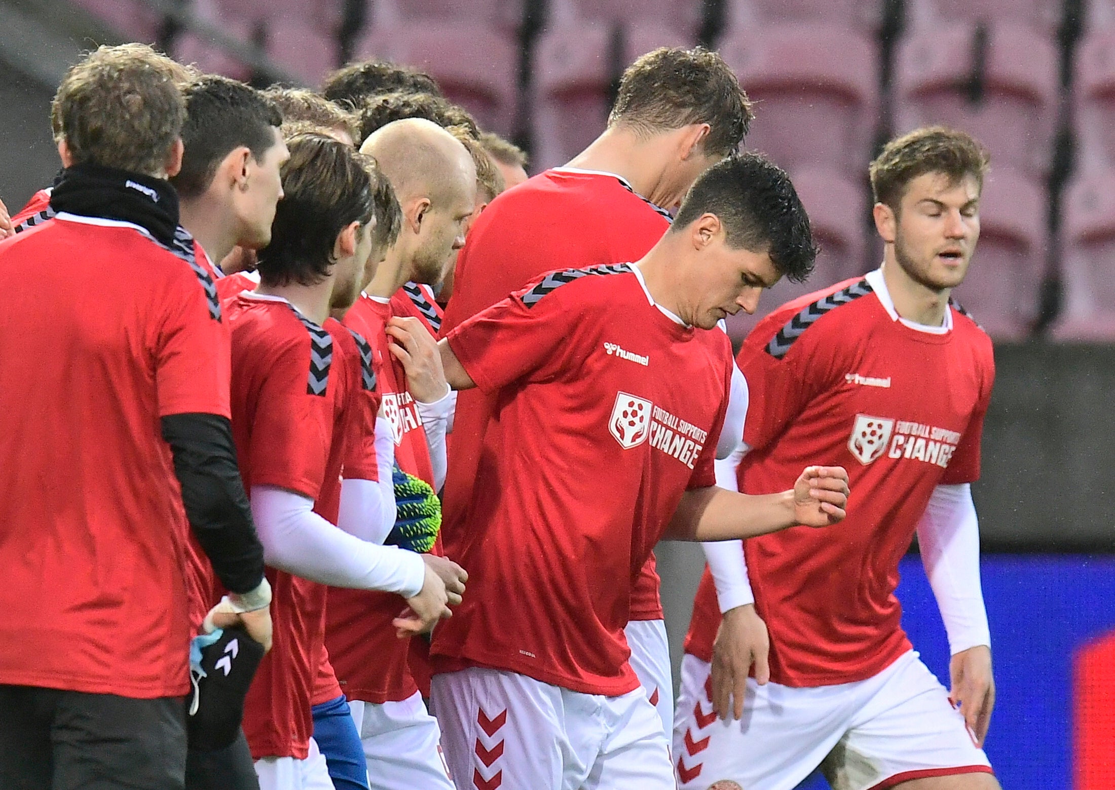 Denmark’s National team players wear shirts reading “Football supports change” prior to the World Cup qualifierthe World Cup qualifier in group F between Denmark and Moldova last month.