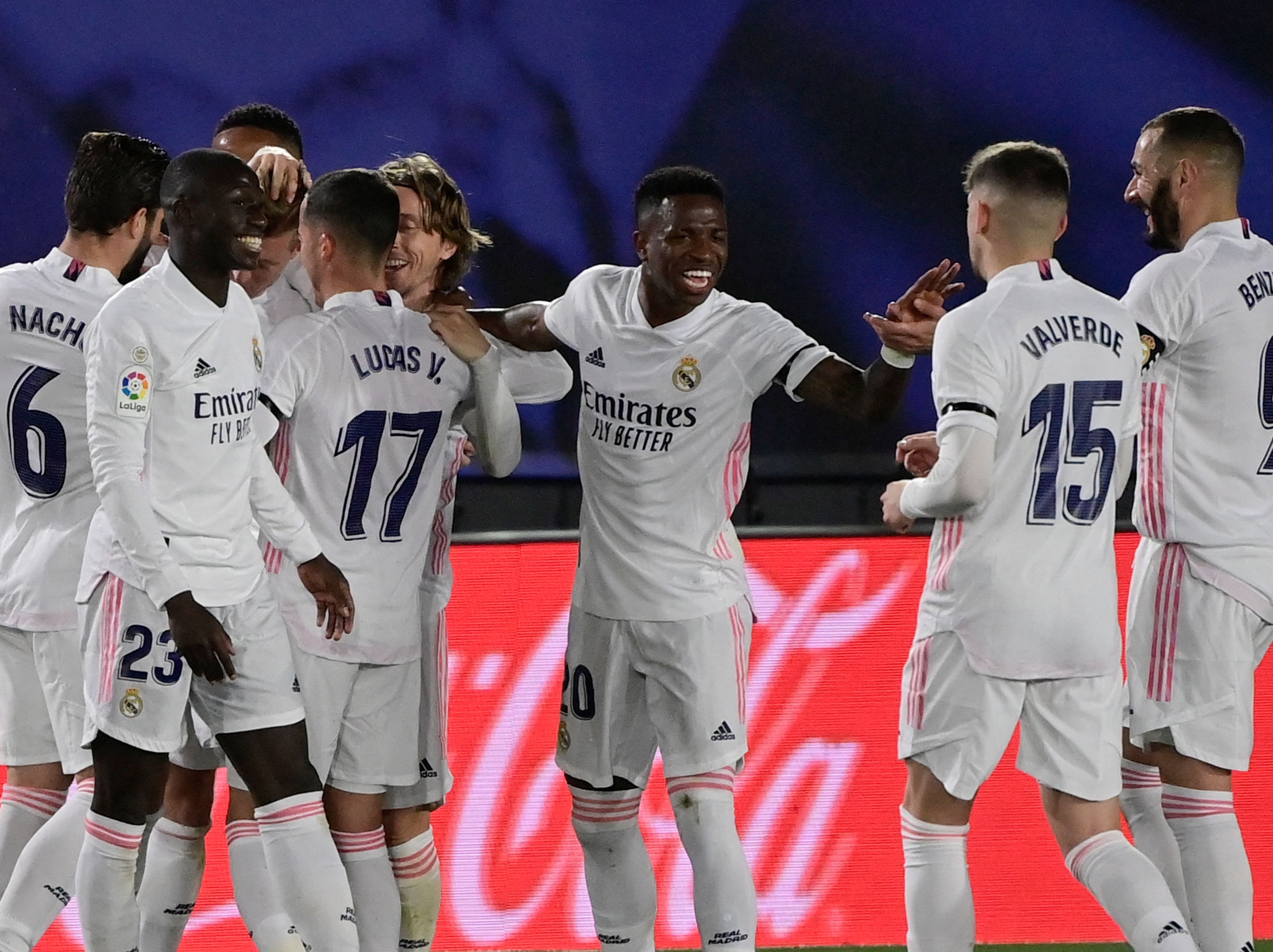 Real Madrid players celebrate during their derby win against Barca