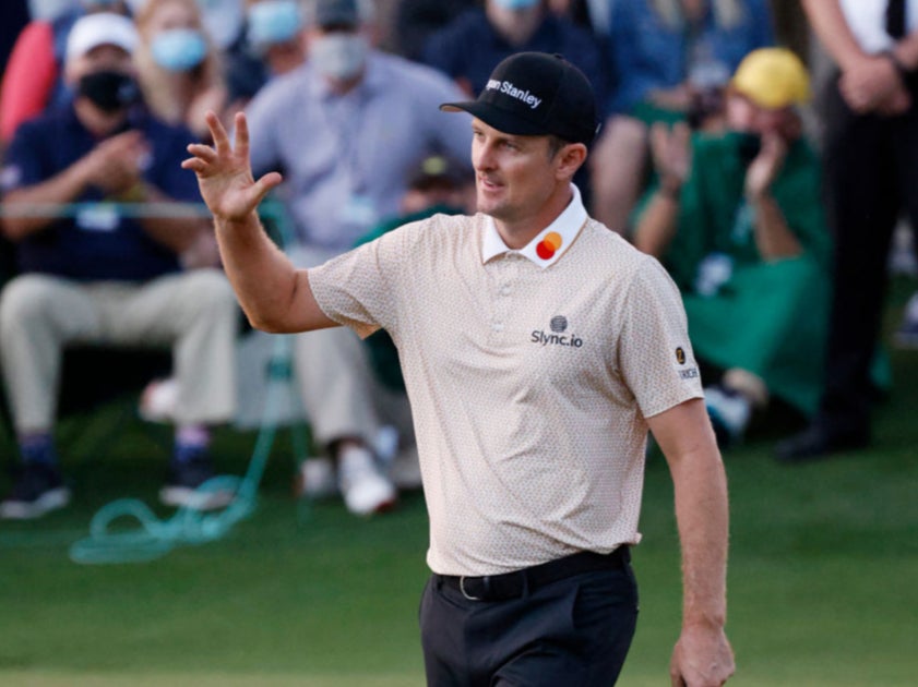 Justin Rose reacts on the 18th green