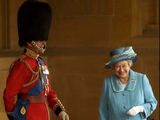 The real story behind the giggling photograph of Prince Philip and the Queen 