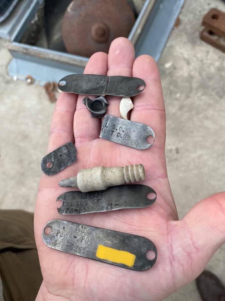 A photo, posted on Facebook, of the dog tags found inside the 12ft alligator’s stomach