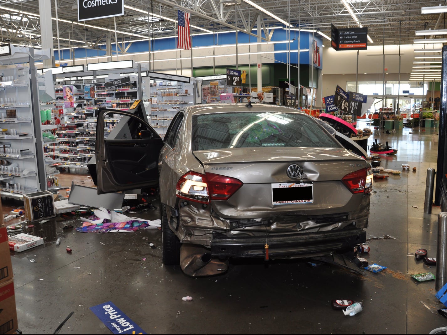 Pictures released by Concord police show damage caused to a Walmart store on 2 April