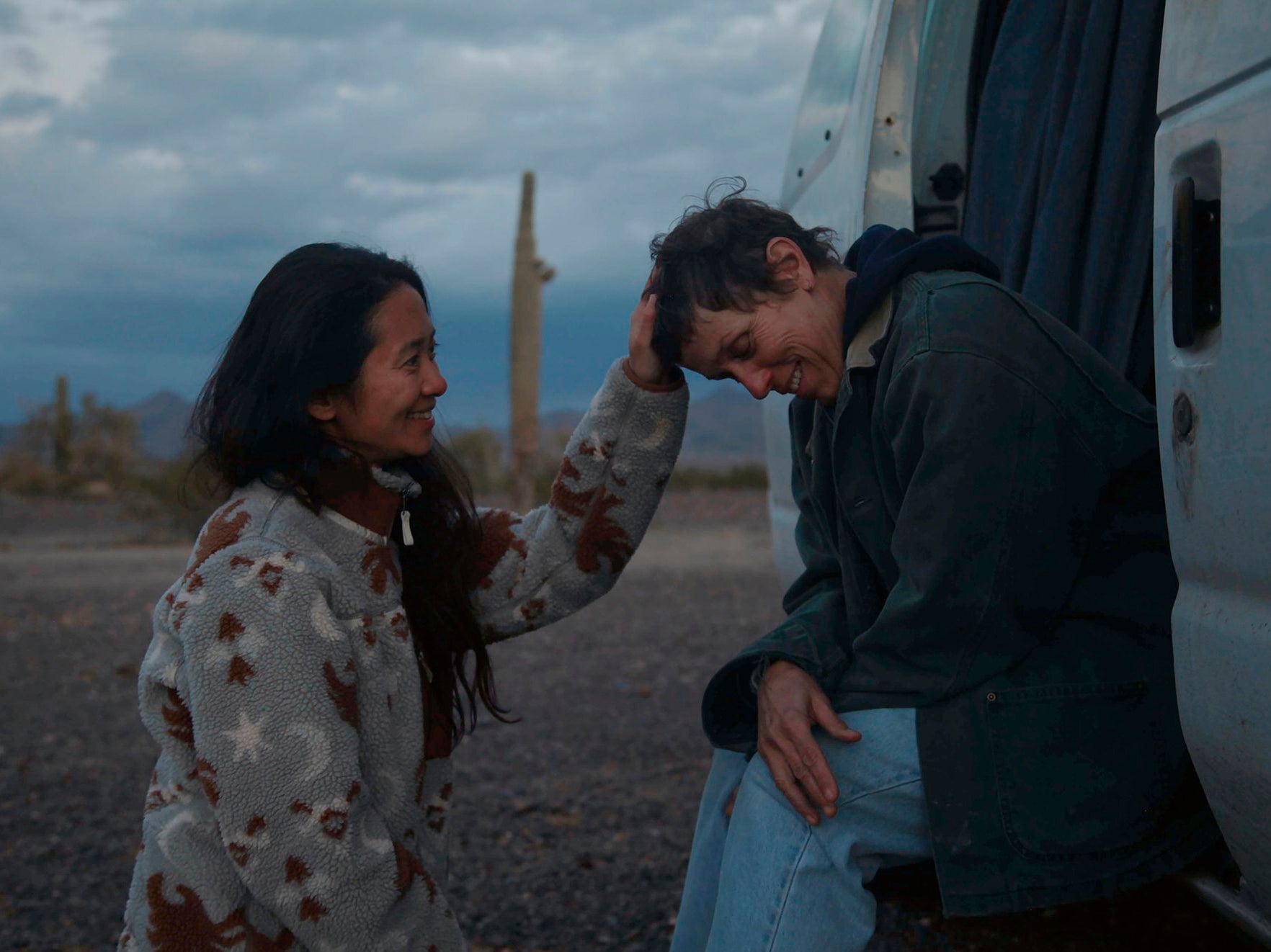 Nomadland is directed by Chloe Zhao, left, with Frances McDormand playing the lead role