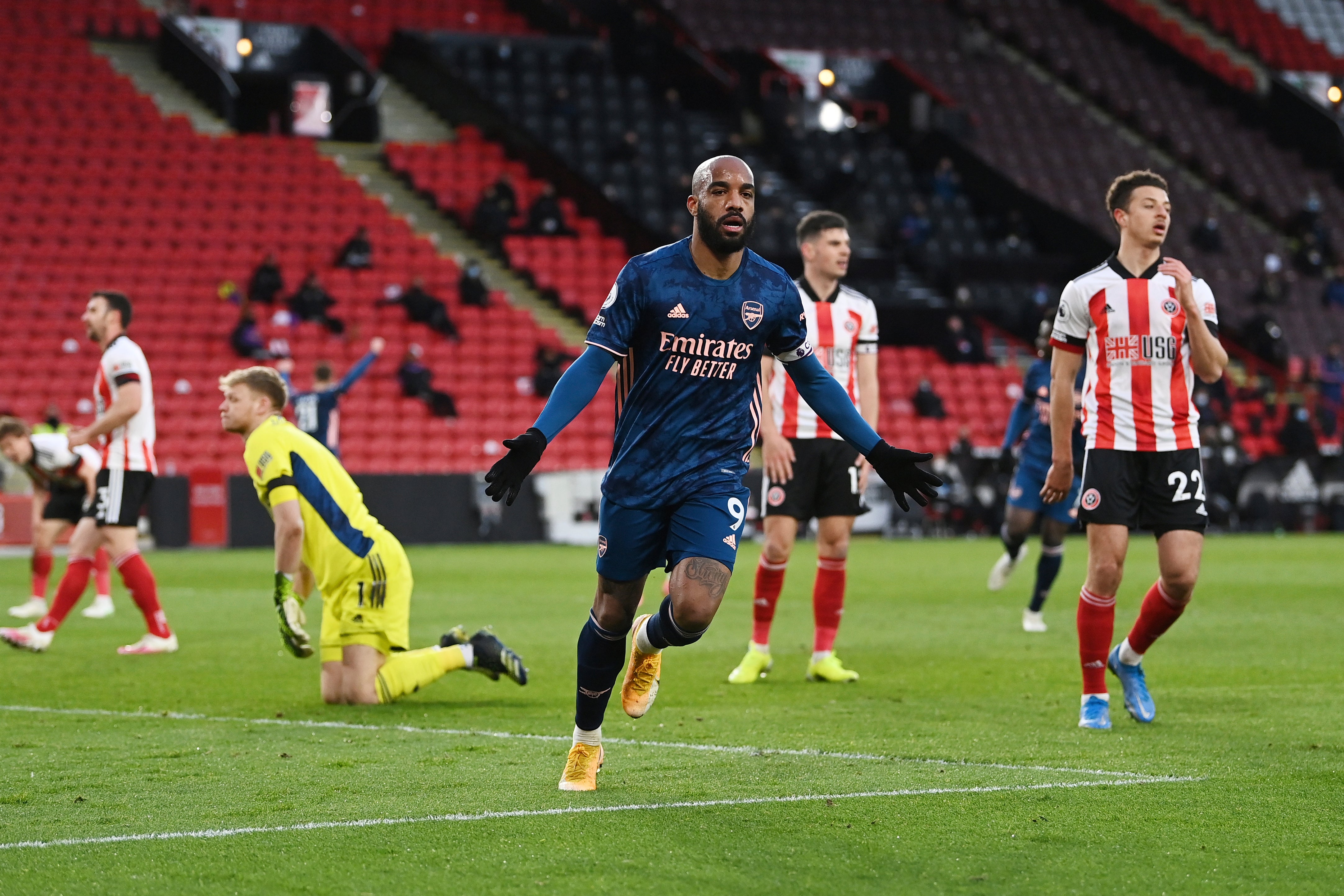 Alexandre Lacazette celebrates after opening the scoring