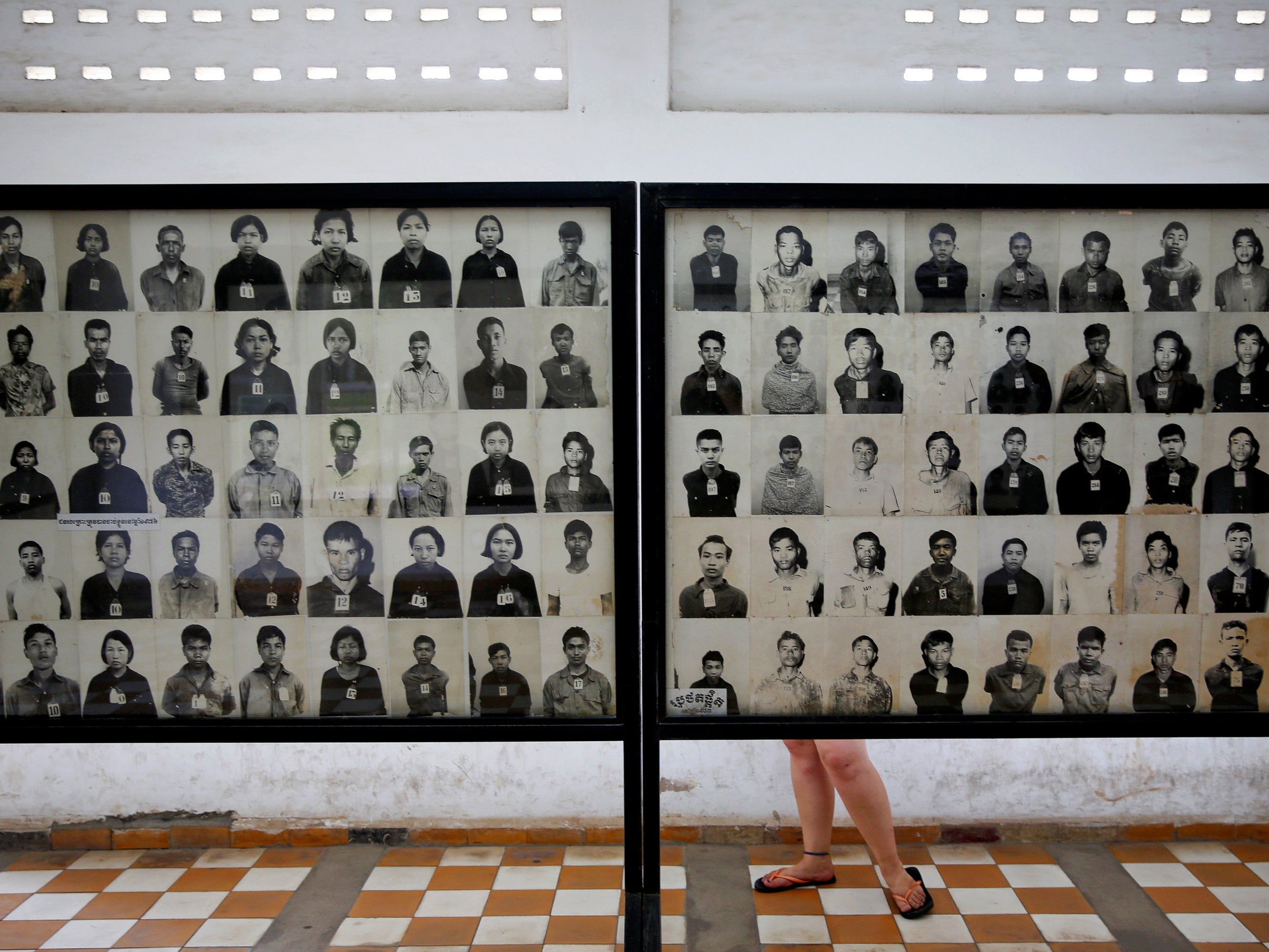 Pictures of victims of the Khmer Rouge regime at the former Tuol Sleng prison that is now a museum on the Cambodian genocide