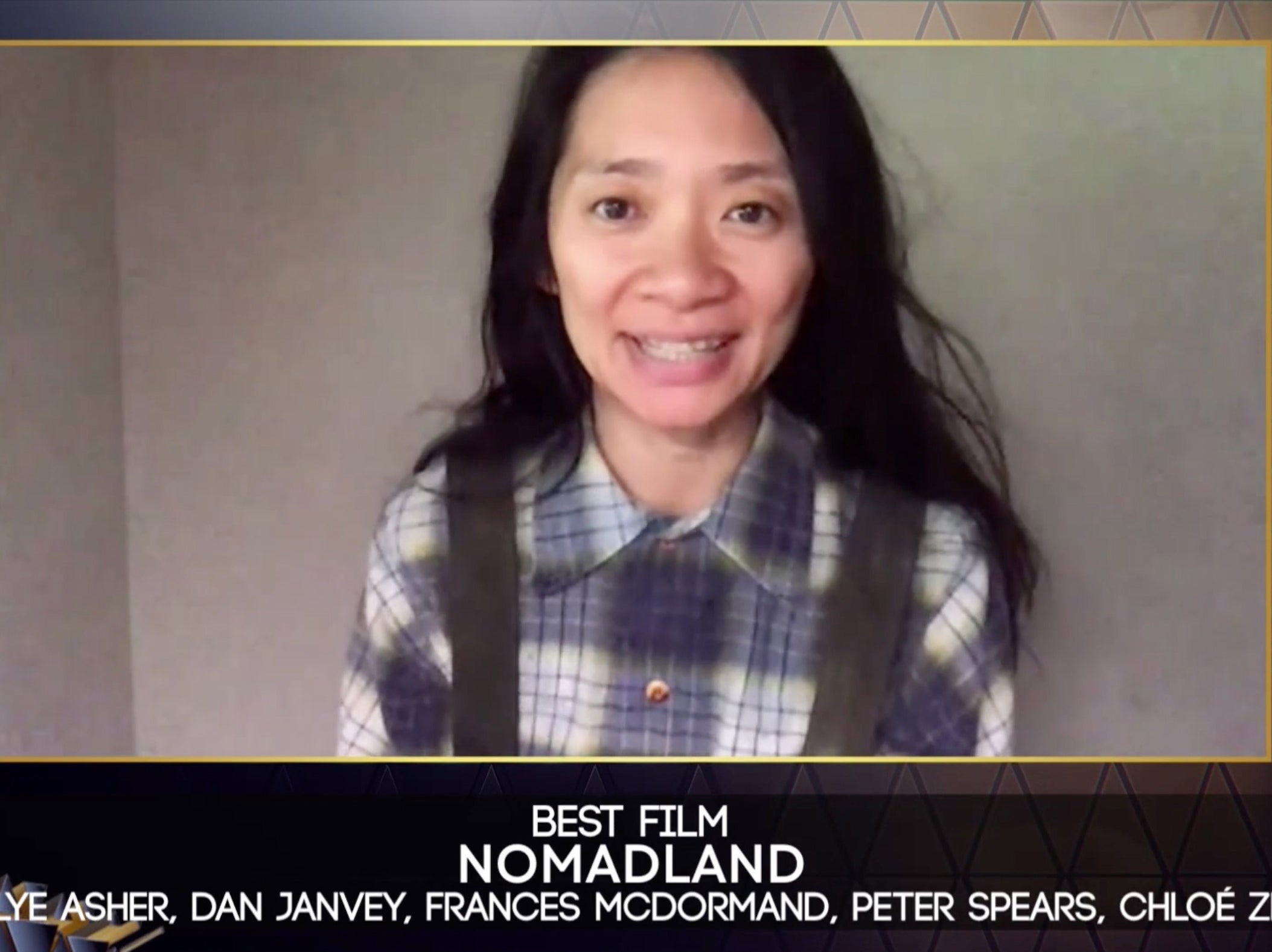 Chloe Zhao accepting the award for Best Film for Nomadland