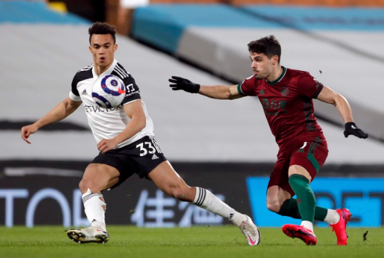 Pedro Neto, right, was brought off against Fulham with an knee injury