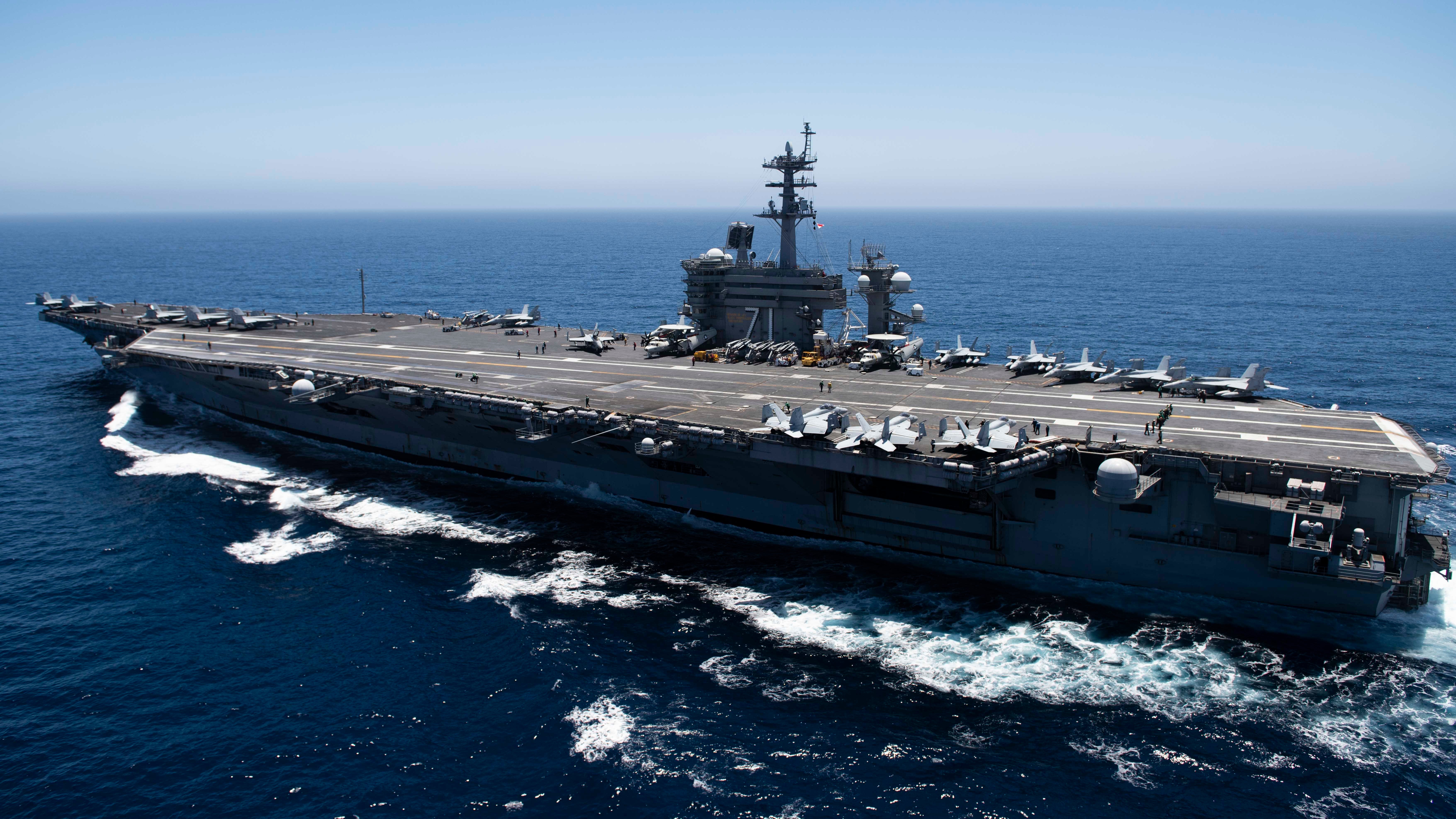 In this handout released by the U.S. Navy, The aircraft carrier USS Theodore Roosevelt (CVN 71) transits the Pacific Ocean. Theodore Roosevelt is conducting routine operations in the Eastern Pacific Ocean