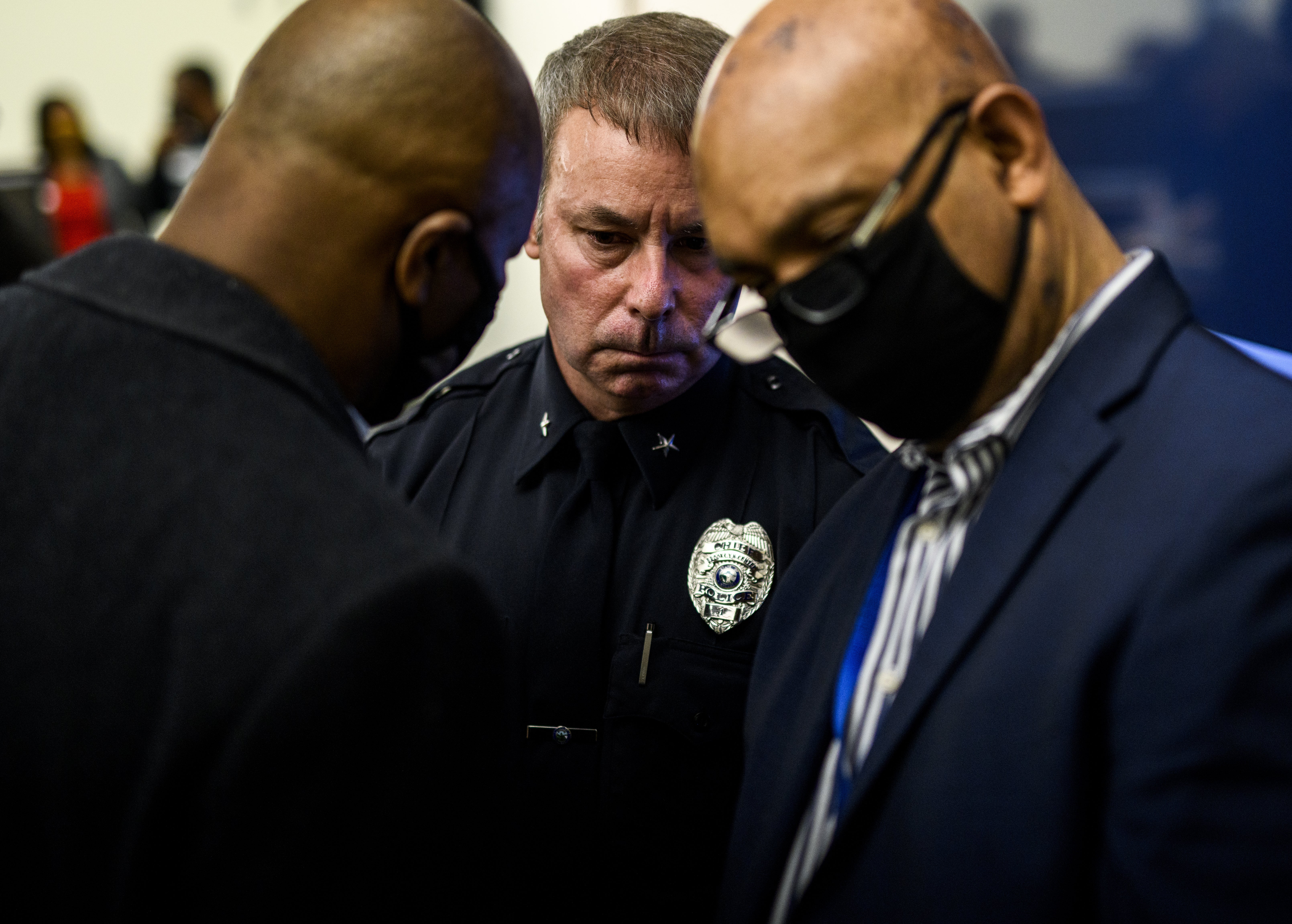 Brooklyn Center Police Chief Tim Gannon (C) attends a press conference regarding the killing of Daunte Wright