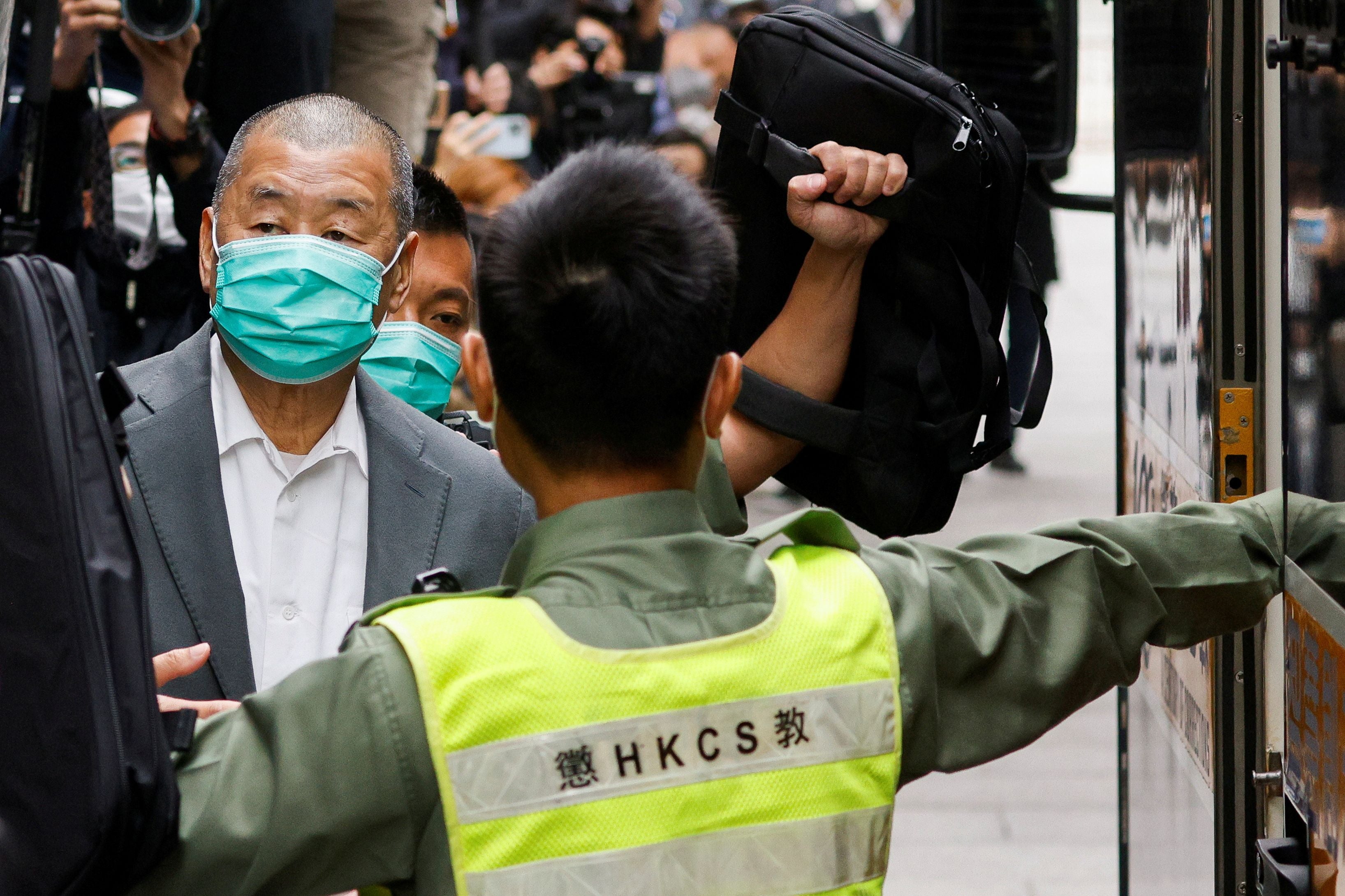 Media mogul Jimmy Lai, founder of Apple Daily, leaves the ourt of final appeal by prison van in Hong Kong, China