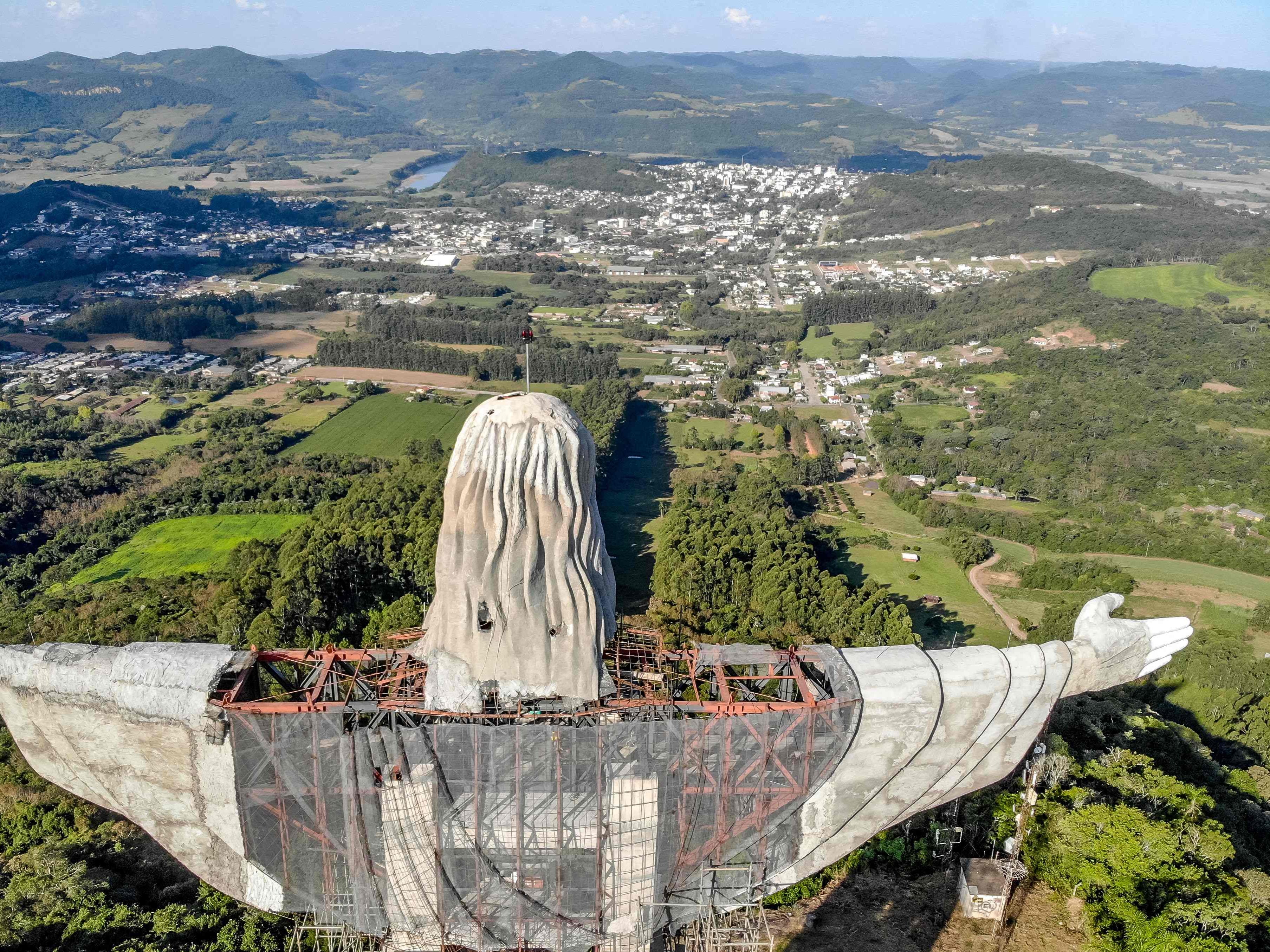 The statue measures 36m from hand to hand