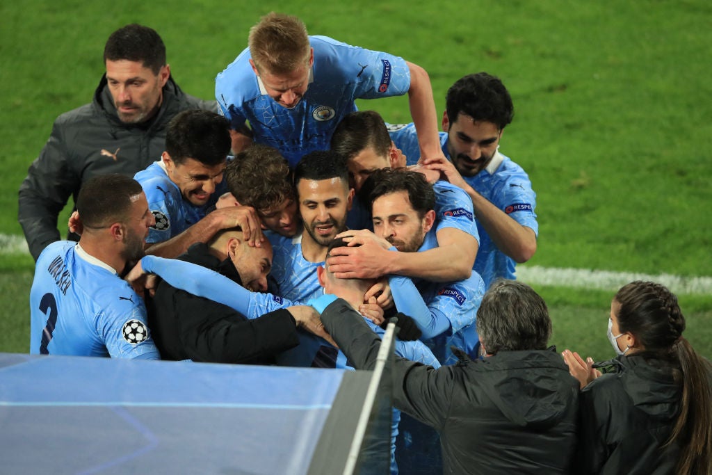 Foden’s teammates and manager mob him after City’s second goal