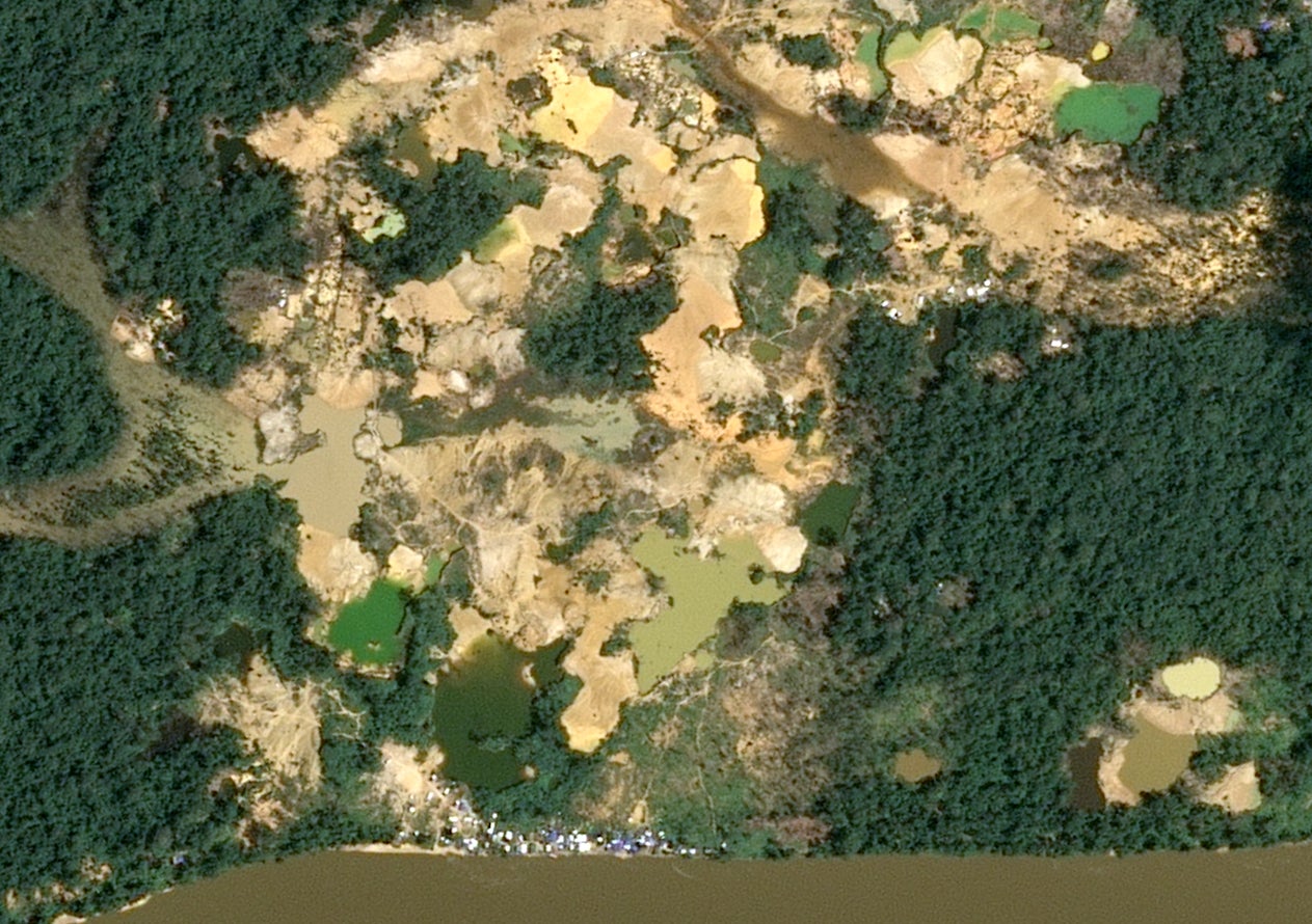 Illegal gold mining on the Uraricoera River, in Yanomami territory