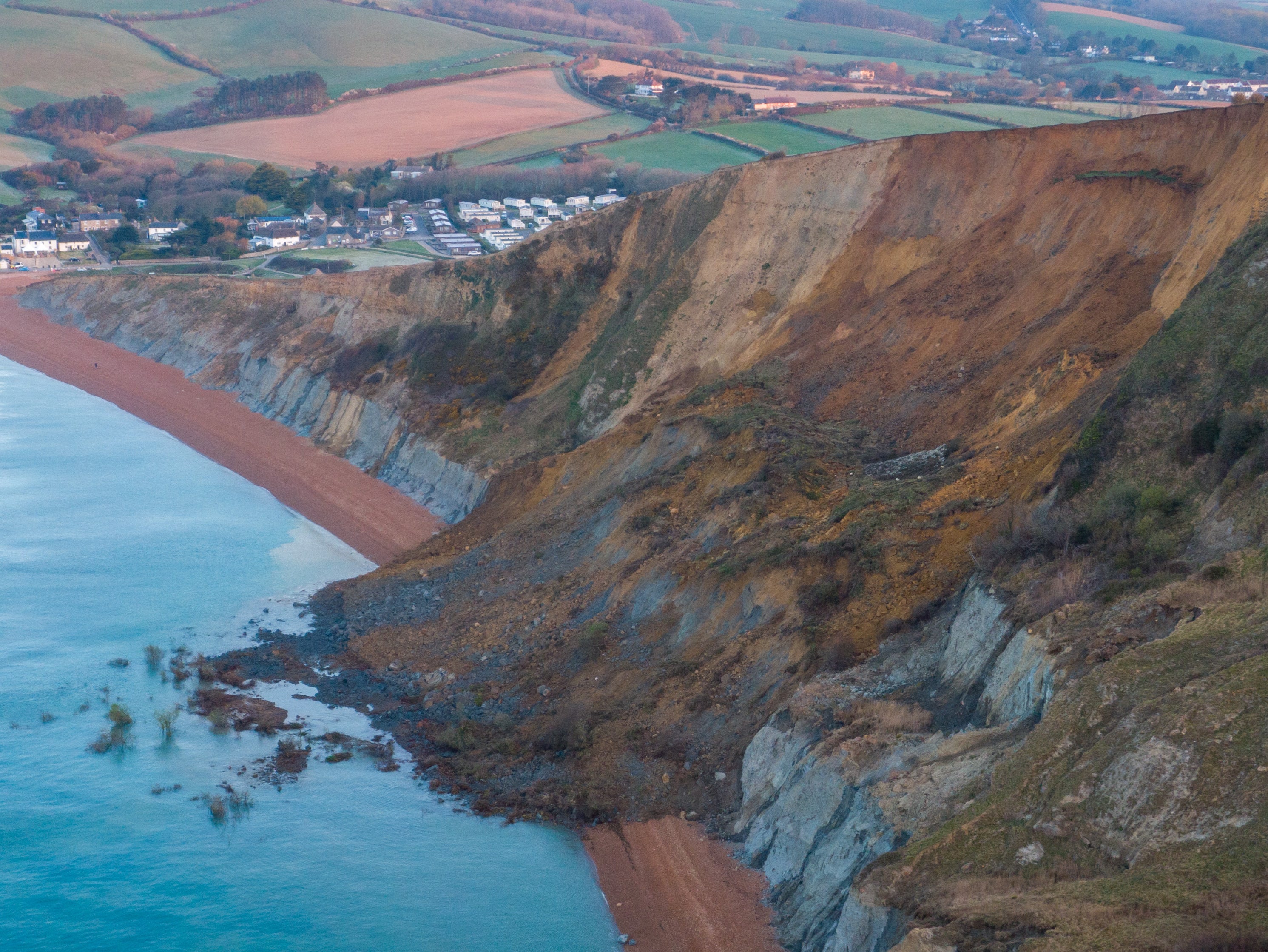 An aerial view of a cliff fall on 14 April in Seatown. The 4,000-ton rockfall blocked off the beach