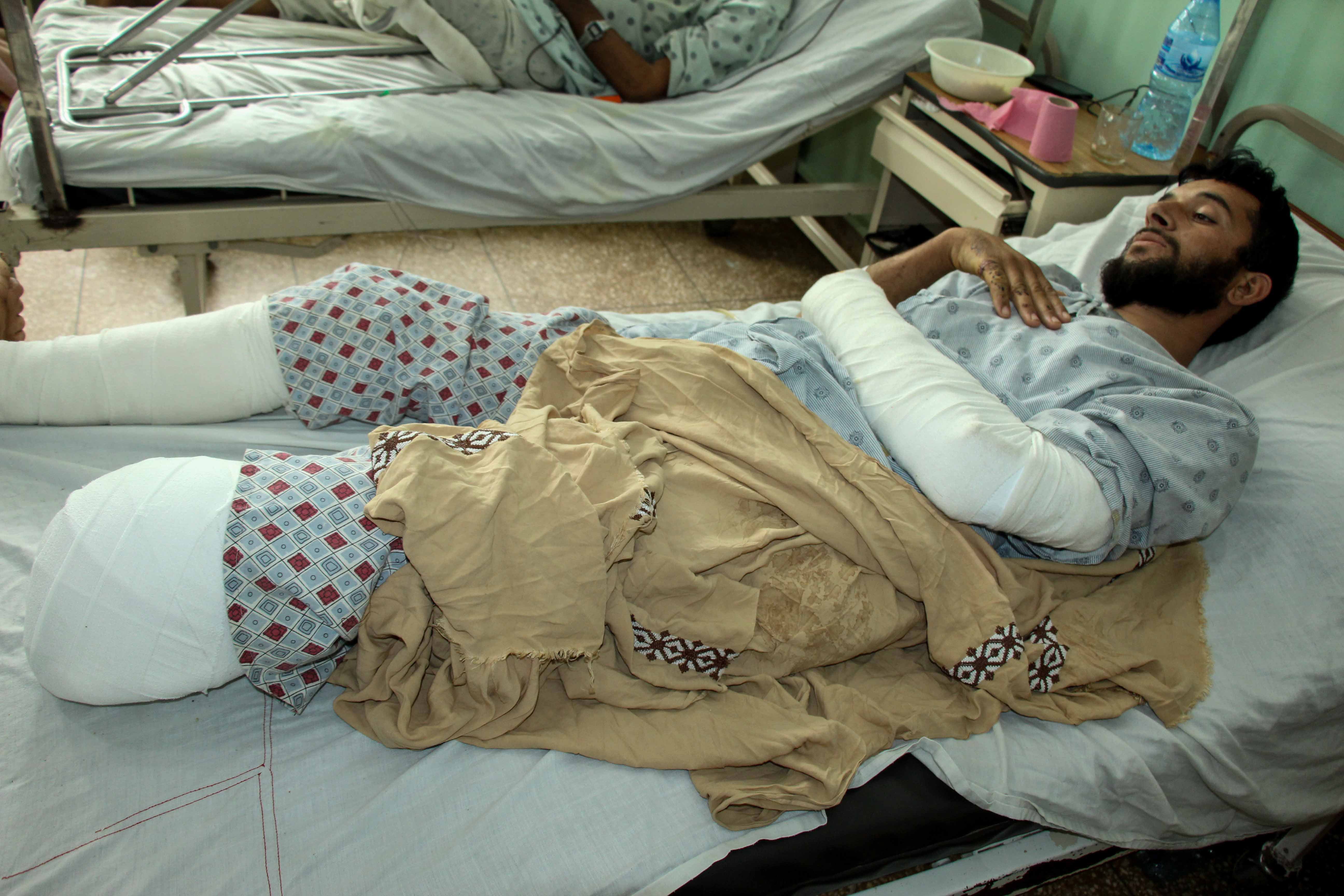 An Afghan man who was injured in a bomb blast a few days ago receives medical treatment at a hospital in Arghandab district of Kandahar, Afghanistan, 15 April 2021