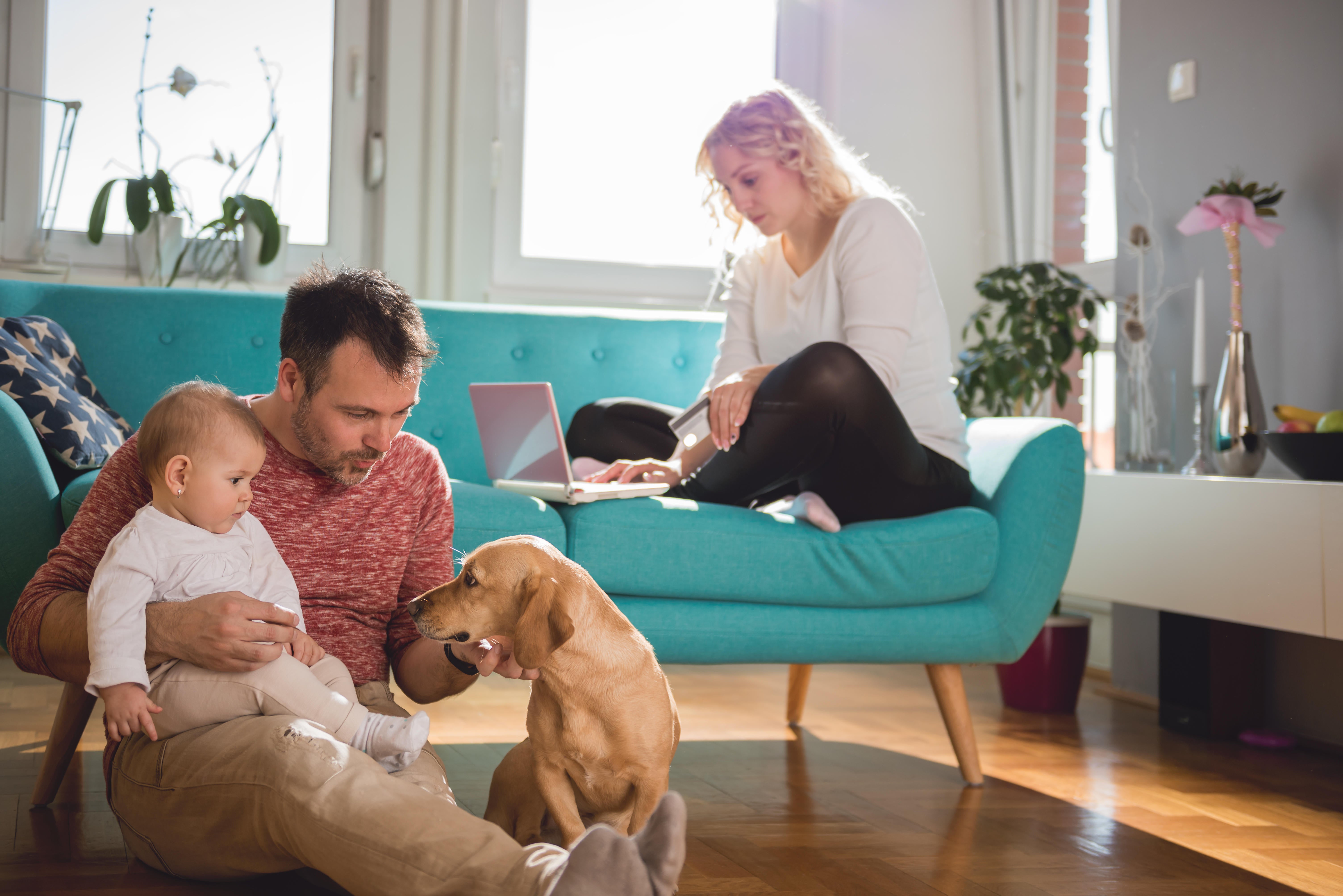 A family at home in their living room