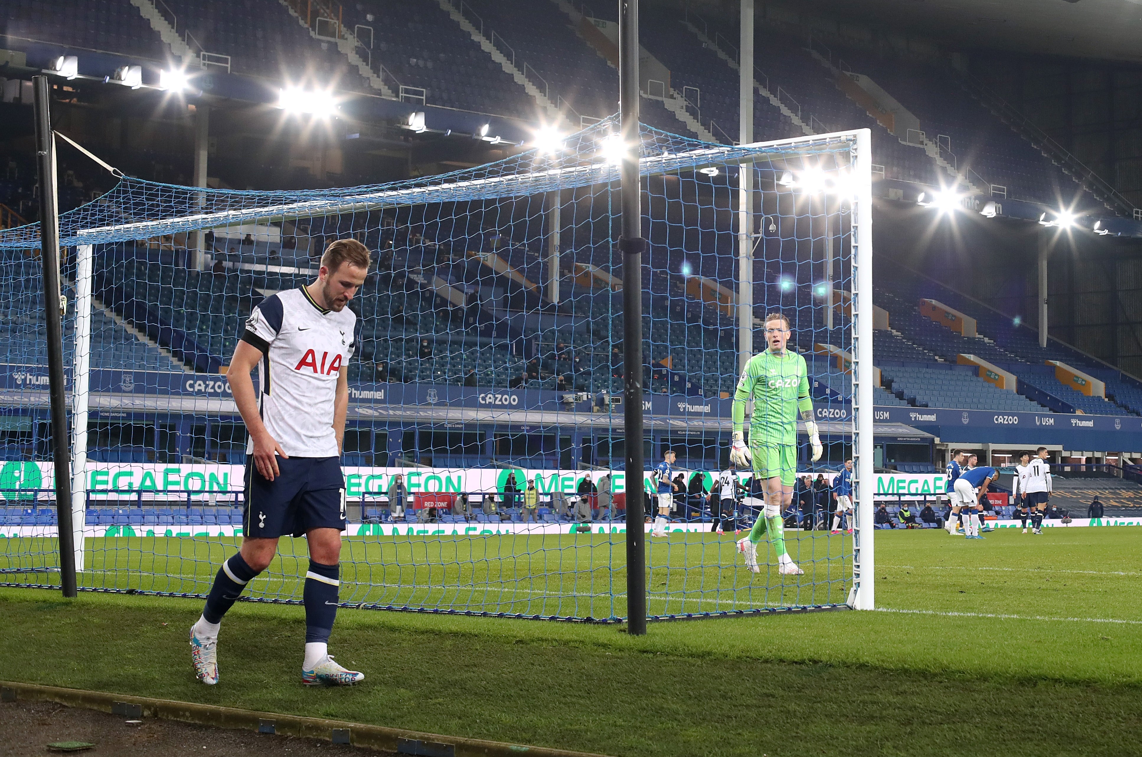 Harry Kane limps away at the end of the match