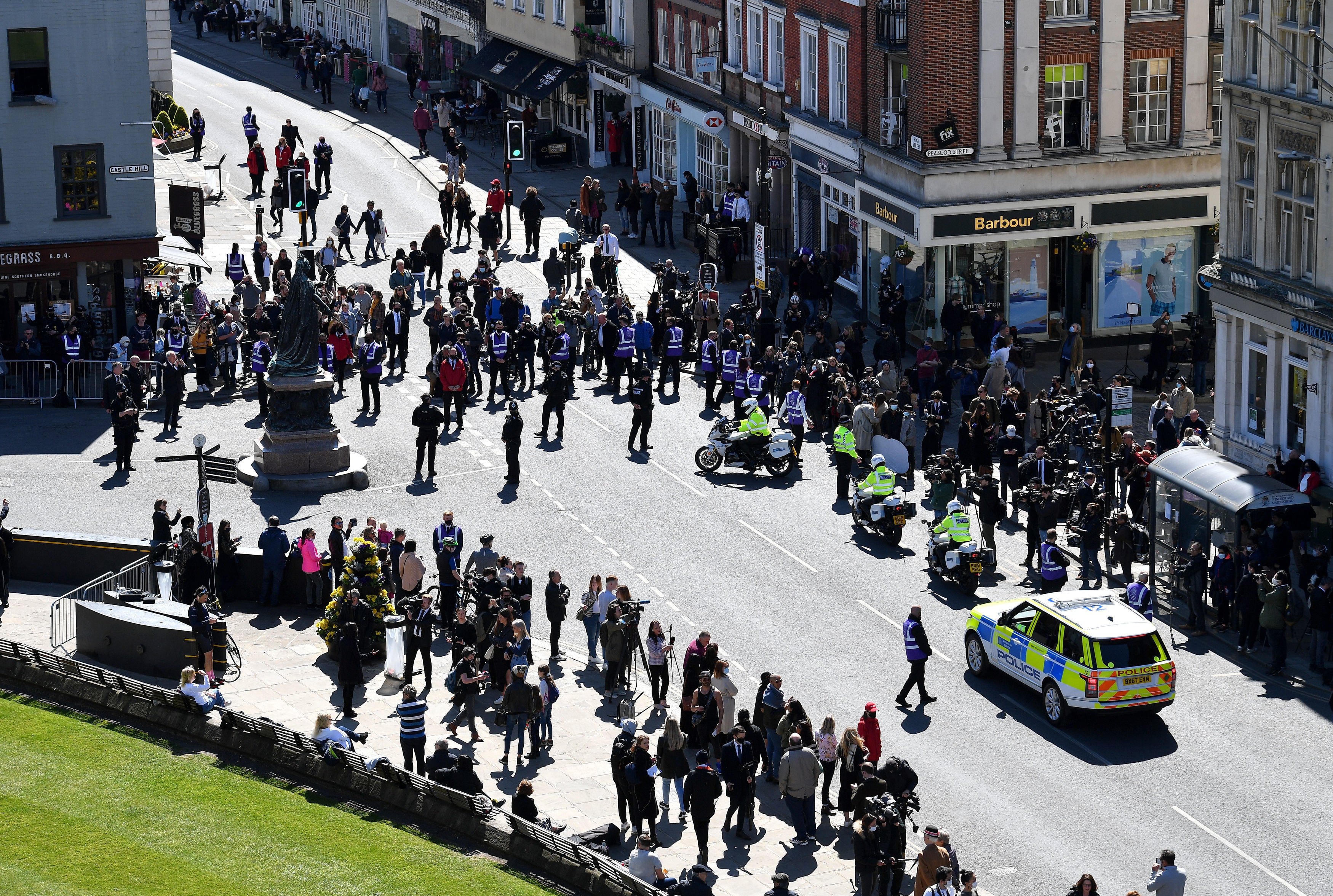 Small but growing crowd outside Windsor Castle for Prince Philip’s funeral on Saturday