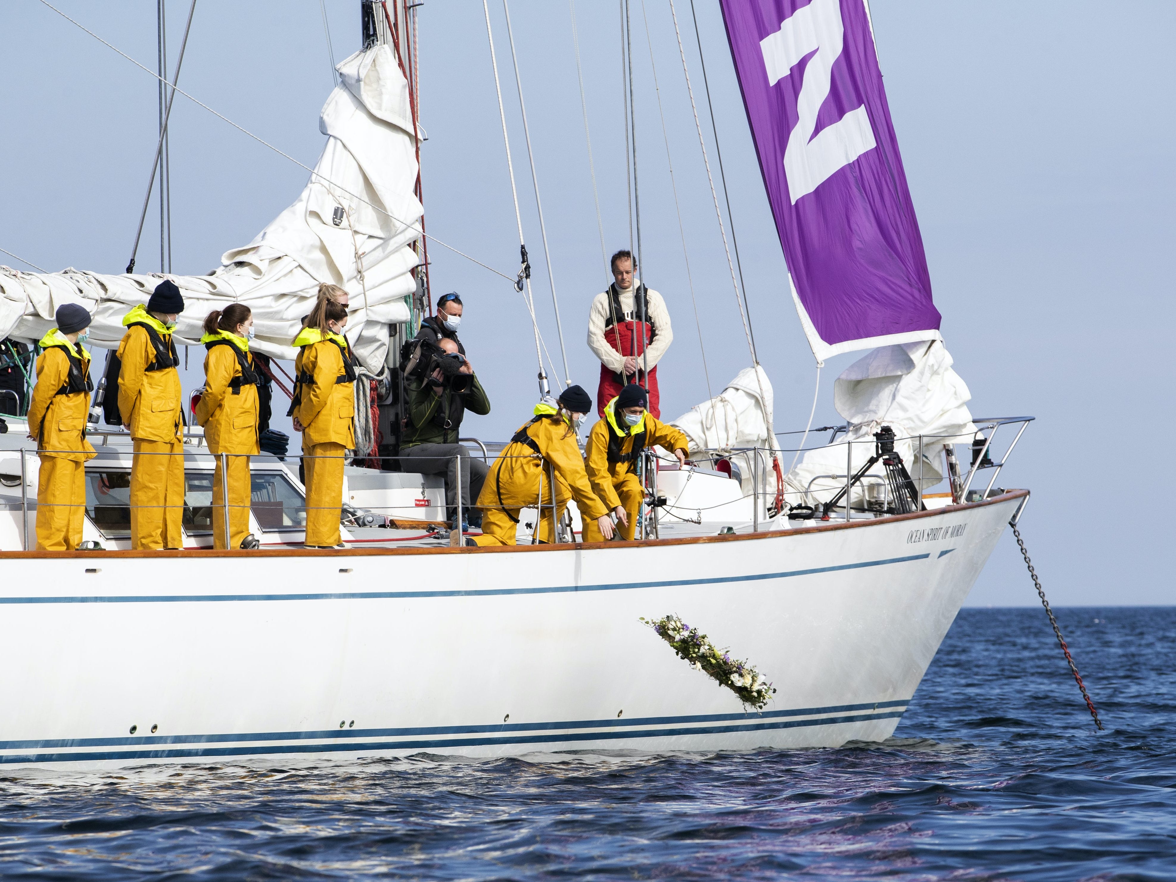 Young sailors from Gordonstoun lay a wreath