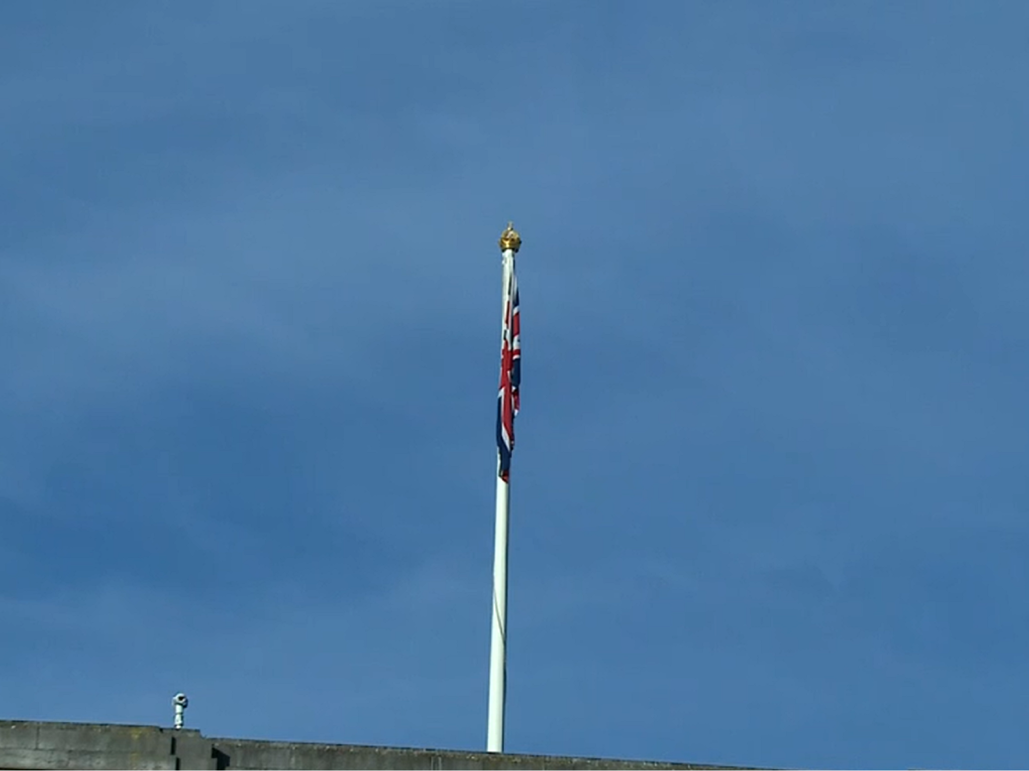 The union flag is raised outside Buckingham Palace the morning after Prince Philip’s funeral