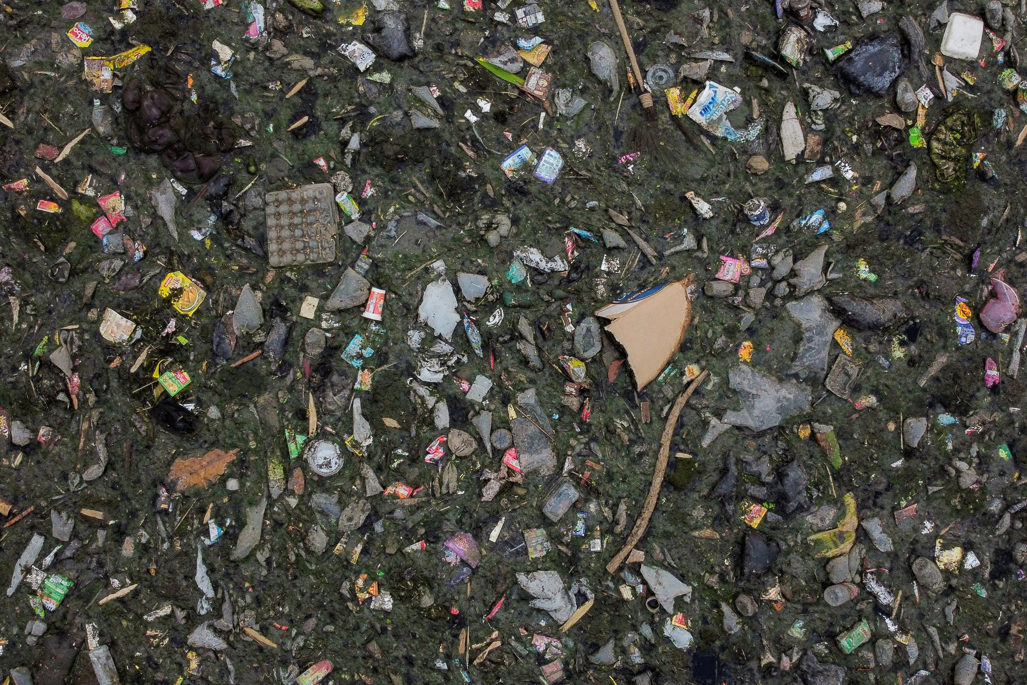 Domestic waste floating on the Citarum River in Bandung, Indonesia