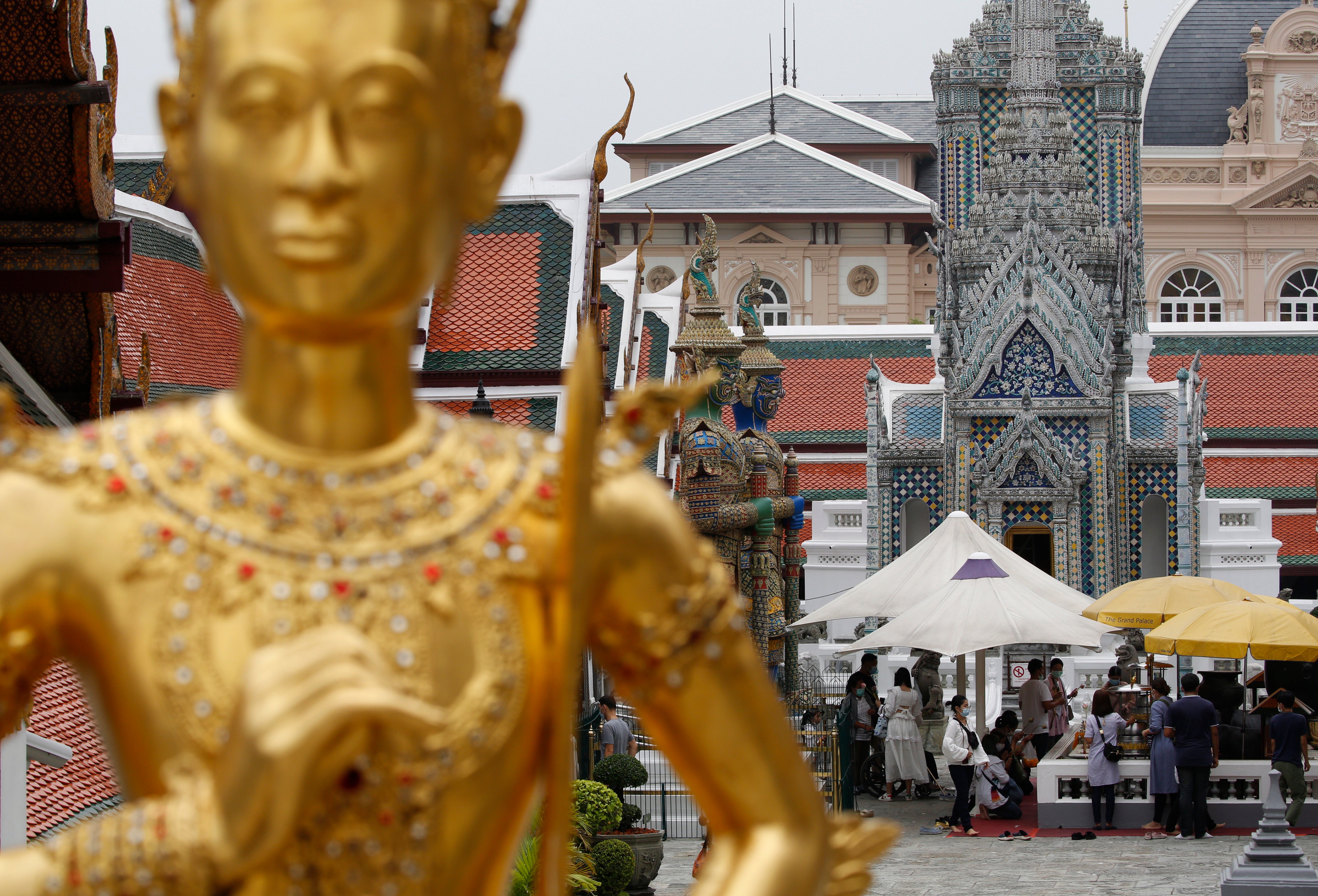 Visitors tour the Temple of the Emerald Buddha at the Grand Palace in Bangkok, Thailand (file picture)