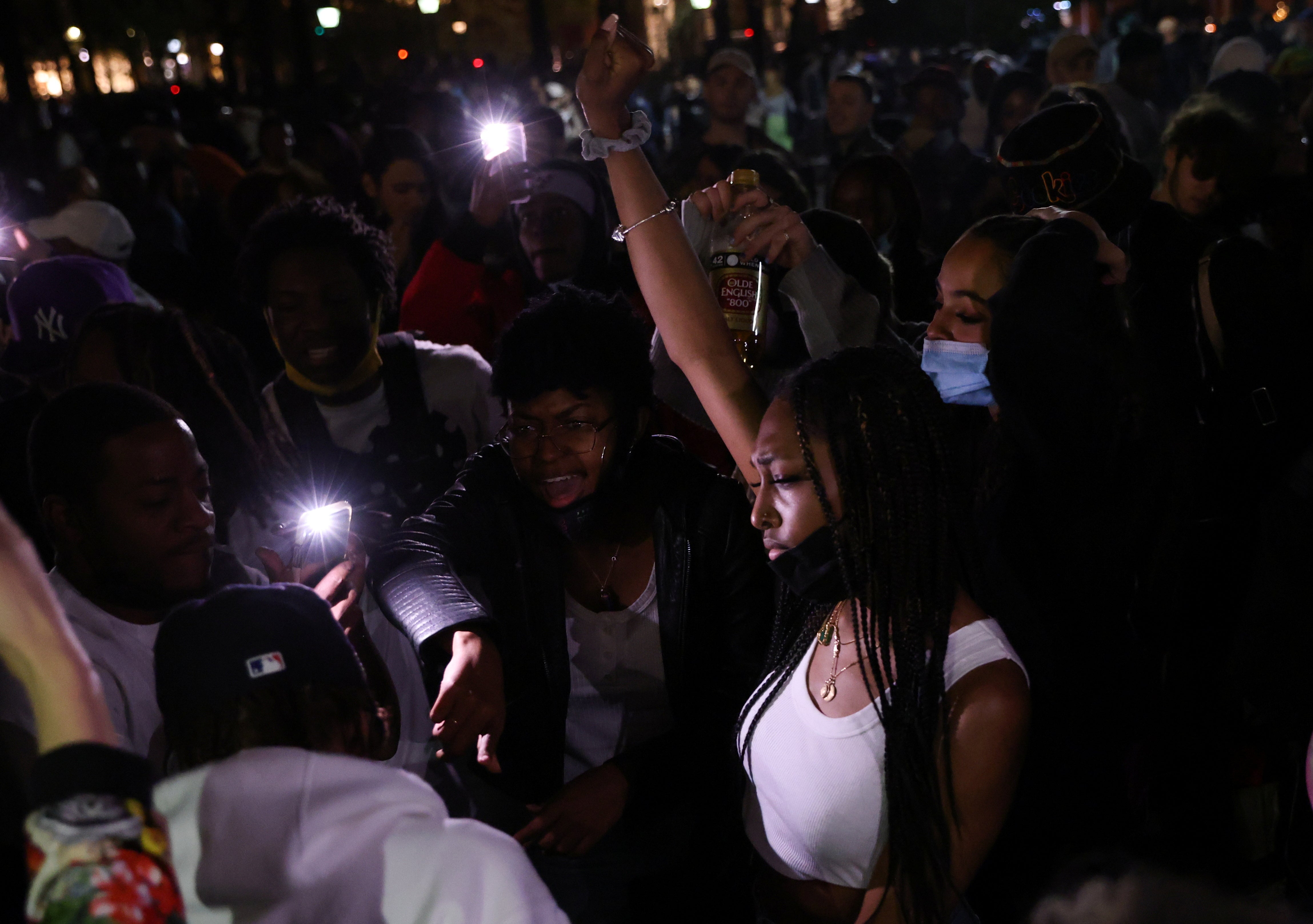 People celebrate and dance in Washington Square Park after the verdict in the trial of former police officer Derek Chauvin