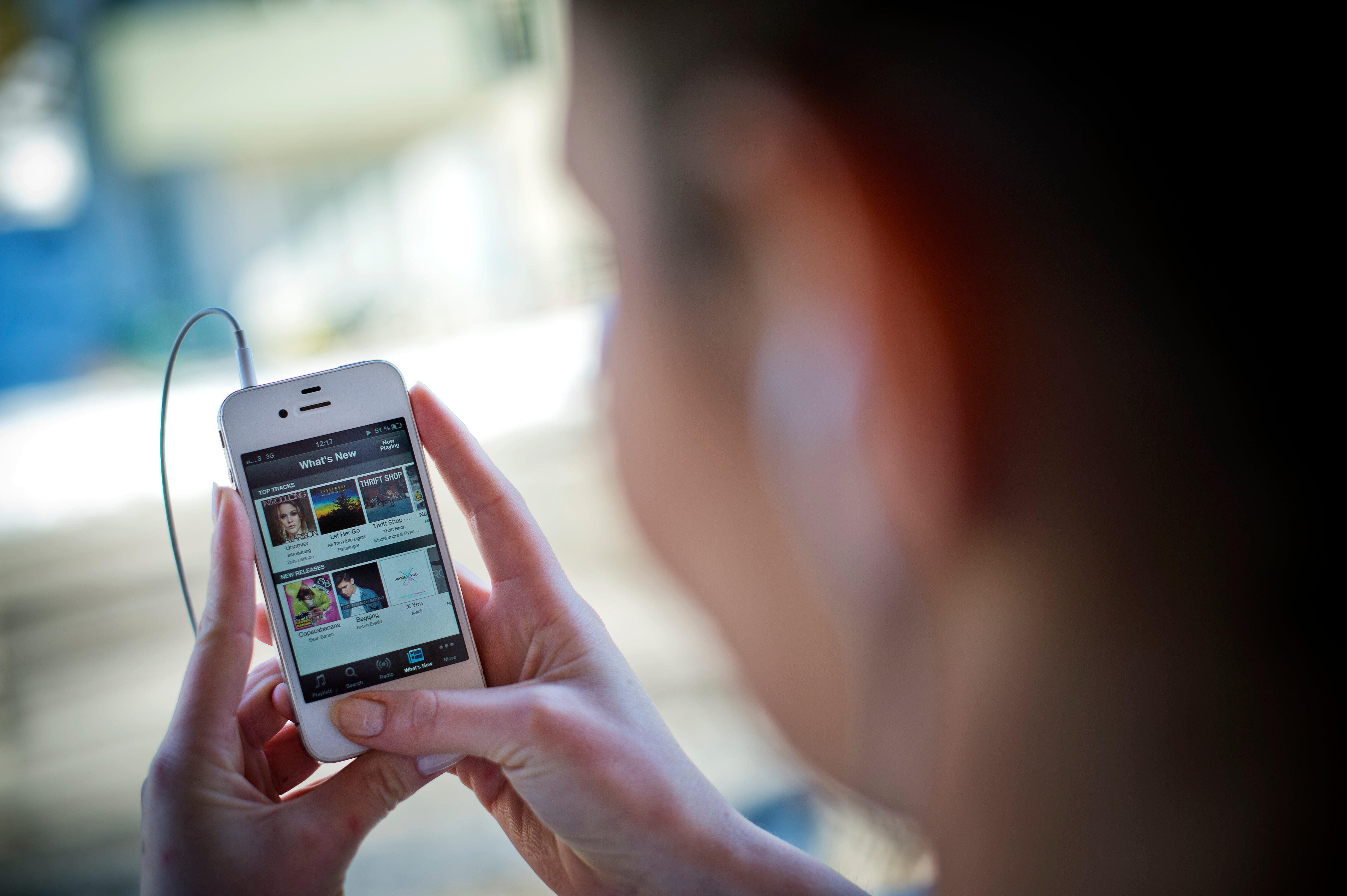 A woman using Spotify in Stockholm, Sweden