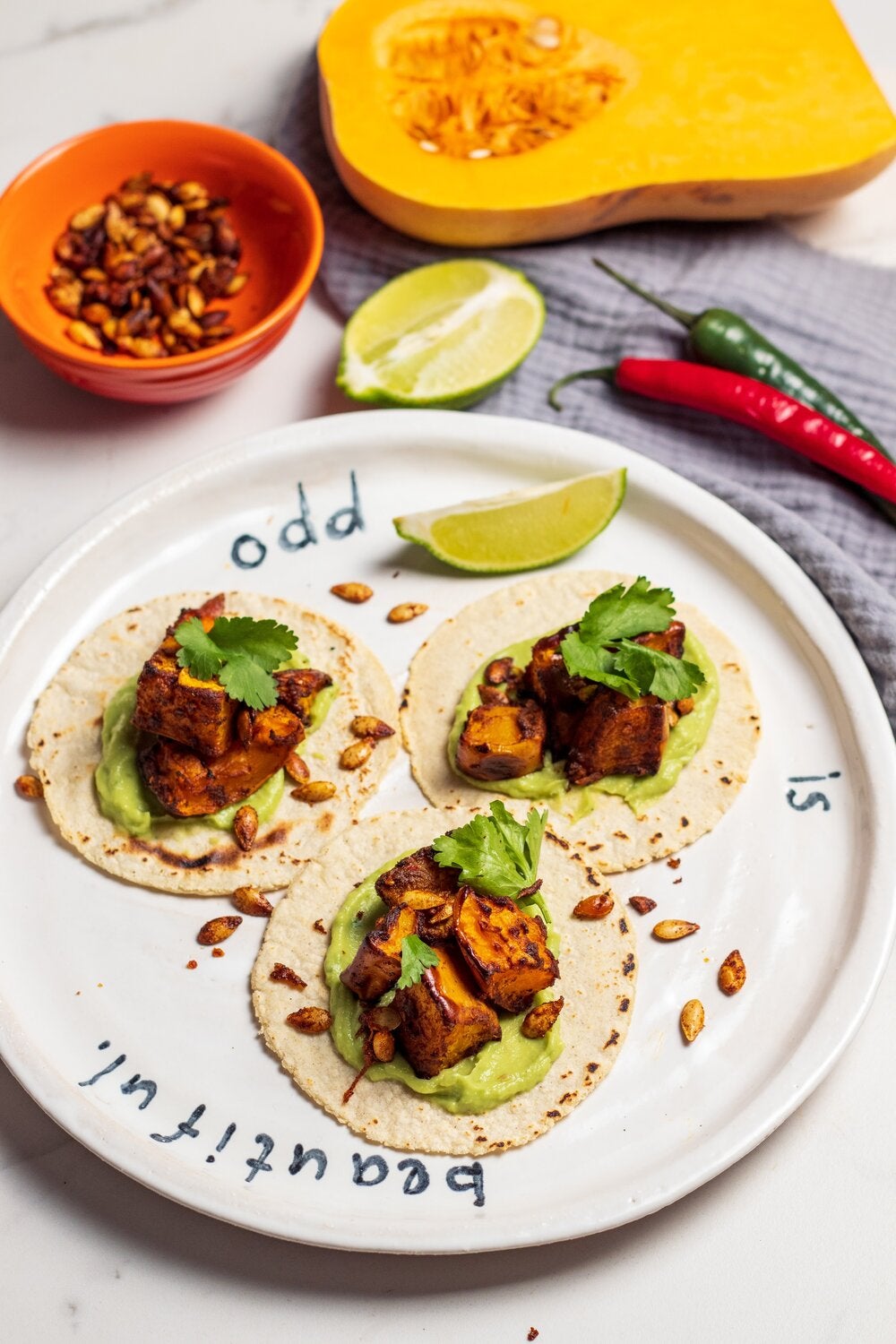 Swap squash for your favourite veg, or speed things up by buying pre-made guac and tacos