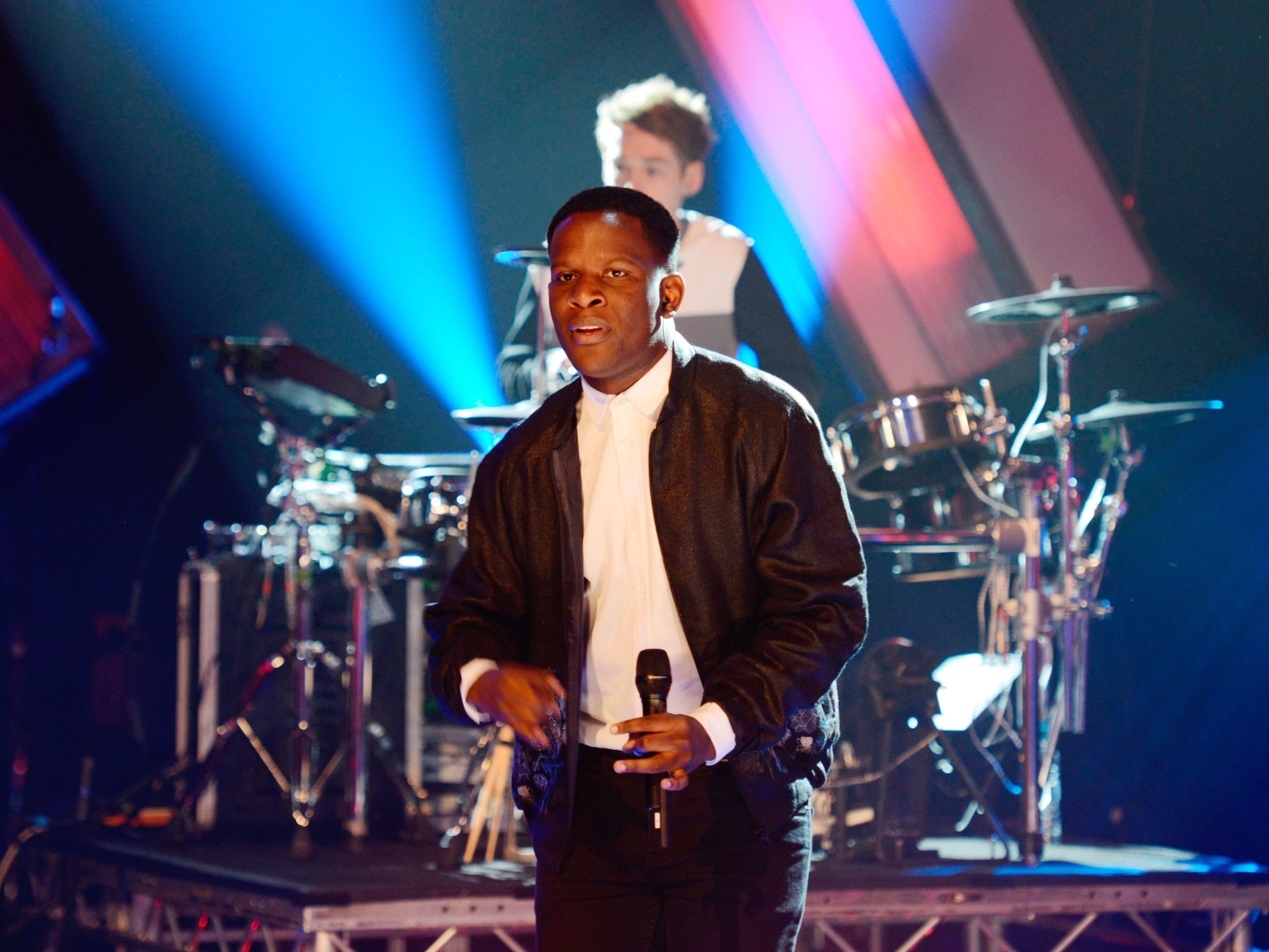 Ssegawa-Ssekintu Kiwanuka onstage with Clean Bandit in 2014