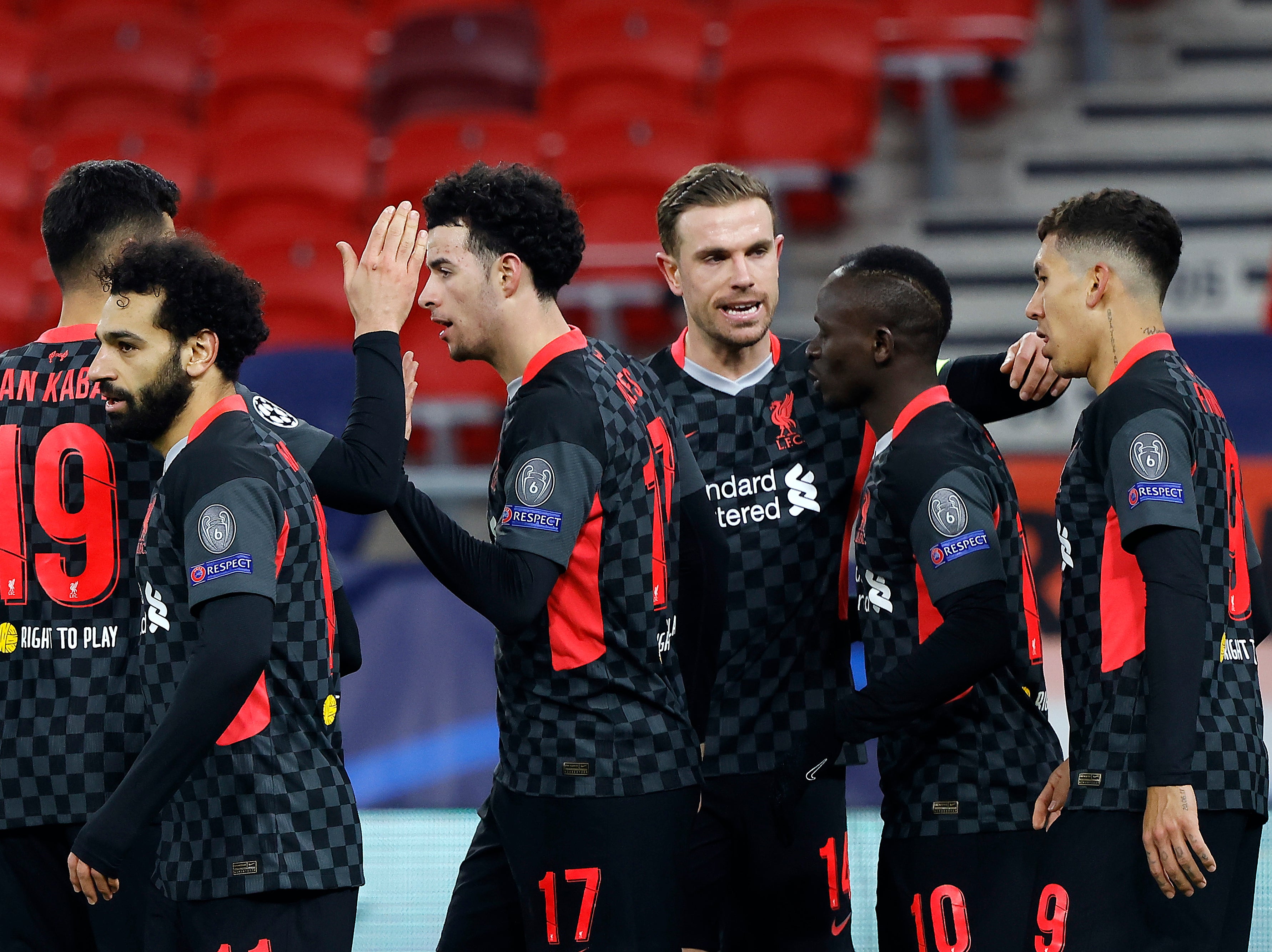 Liverpool captain Jordan Henderson (third right) led his team-mates in posting anti-Super League statements