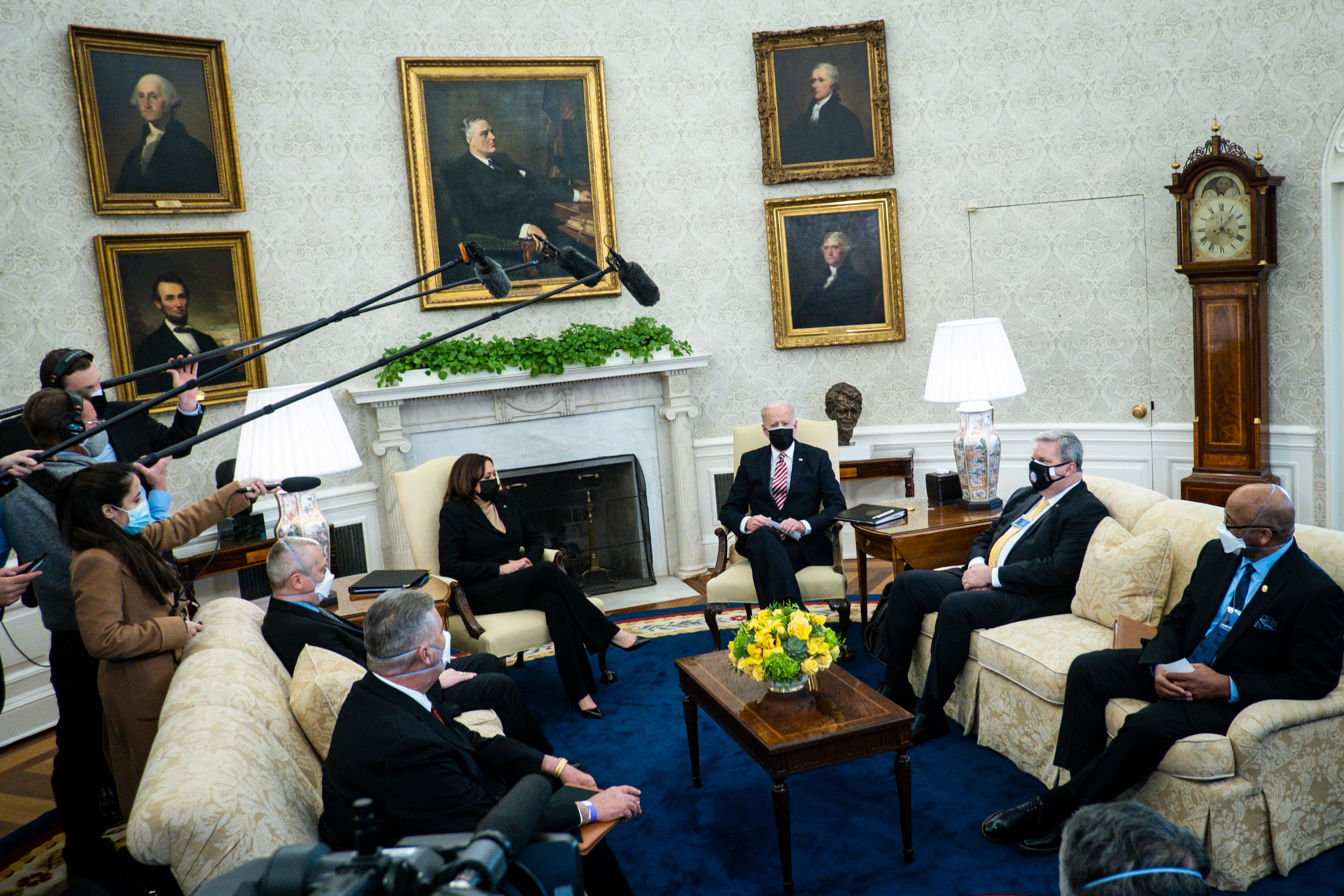 Joe Biden and Kamala Harris meet with union leaders in the Oval Office in February to discuss his $1.9 trillion coronavirus economic stimulus plan