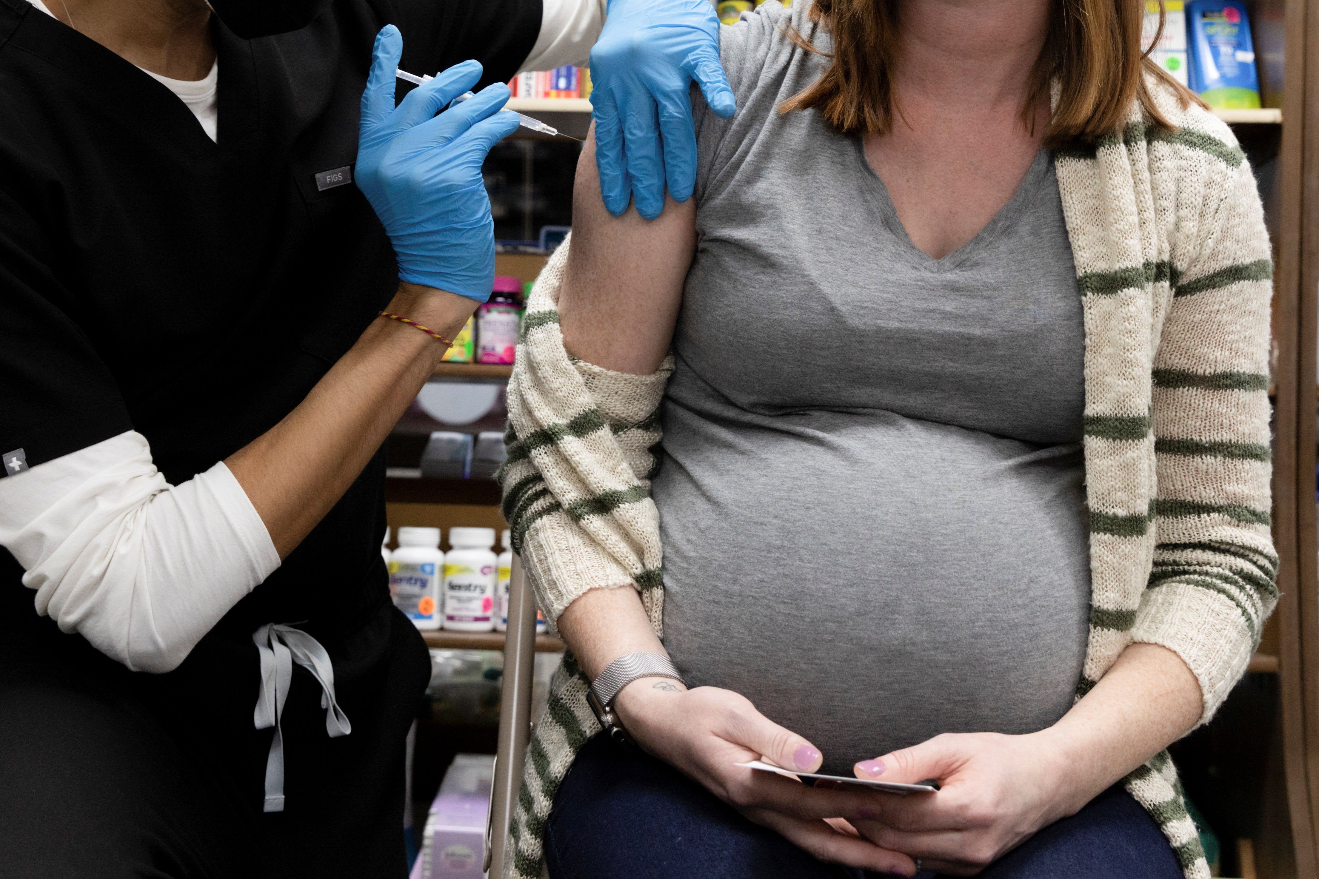 A pregnant woman receives a Covid-19 vaccine in Pennsylvania