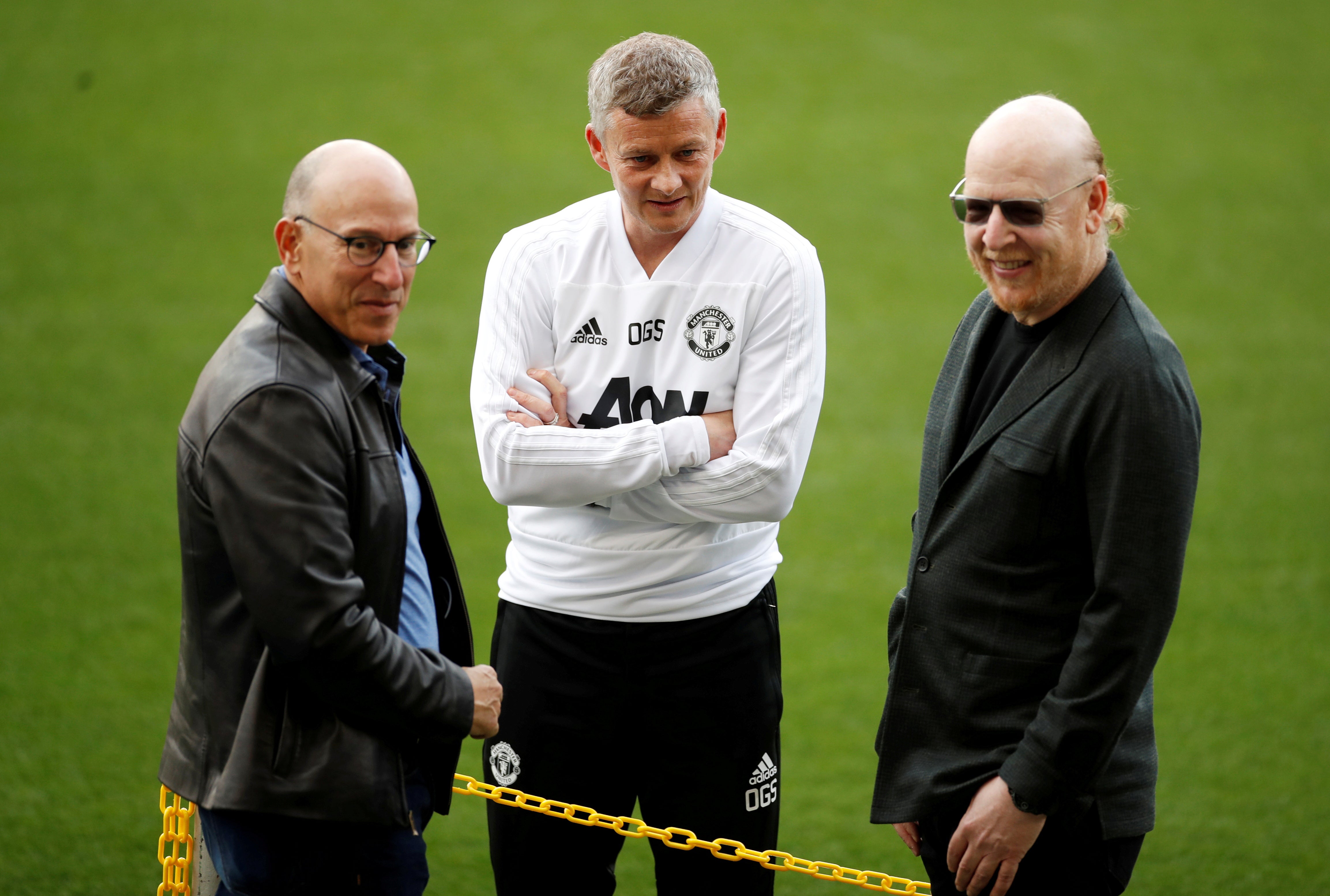 Ole Gunnar Solskjaer with Joel and Avram Glazer