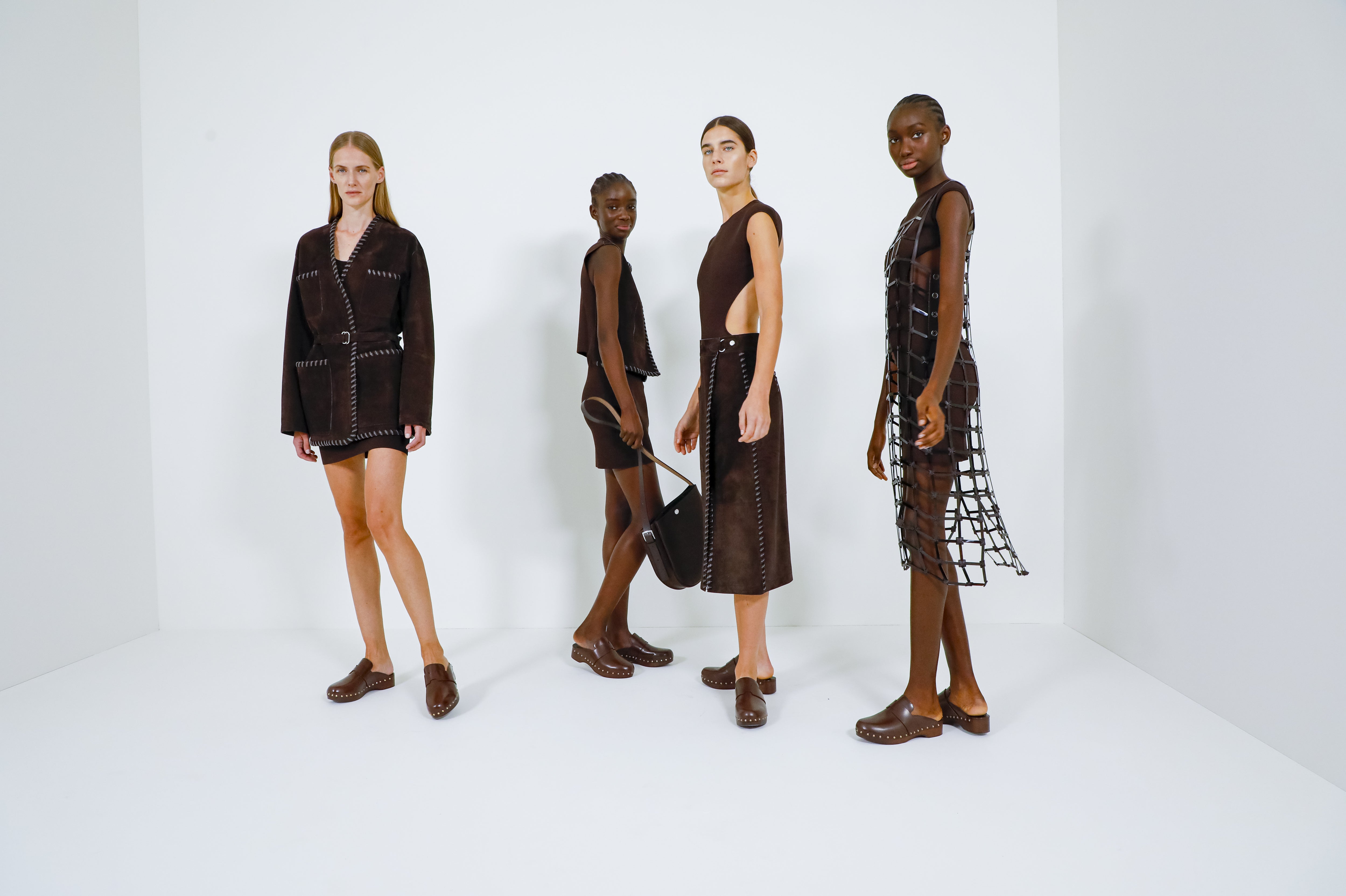 Models wearing clogs backstage at the Hermès spring/summer 2021 show