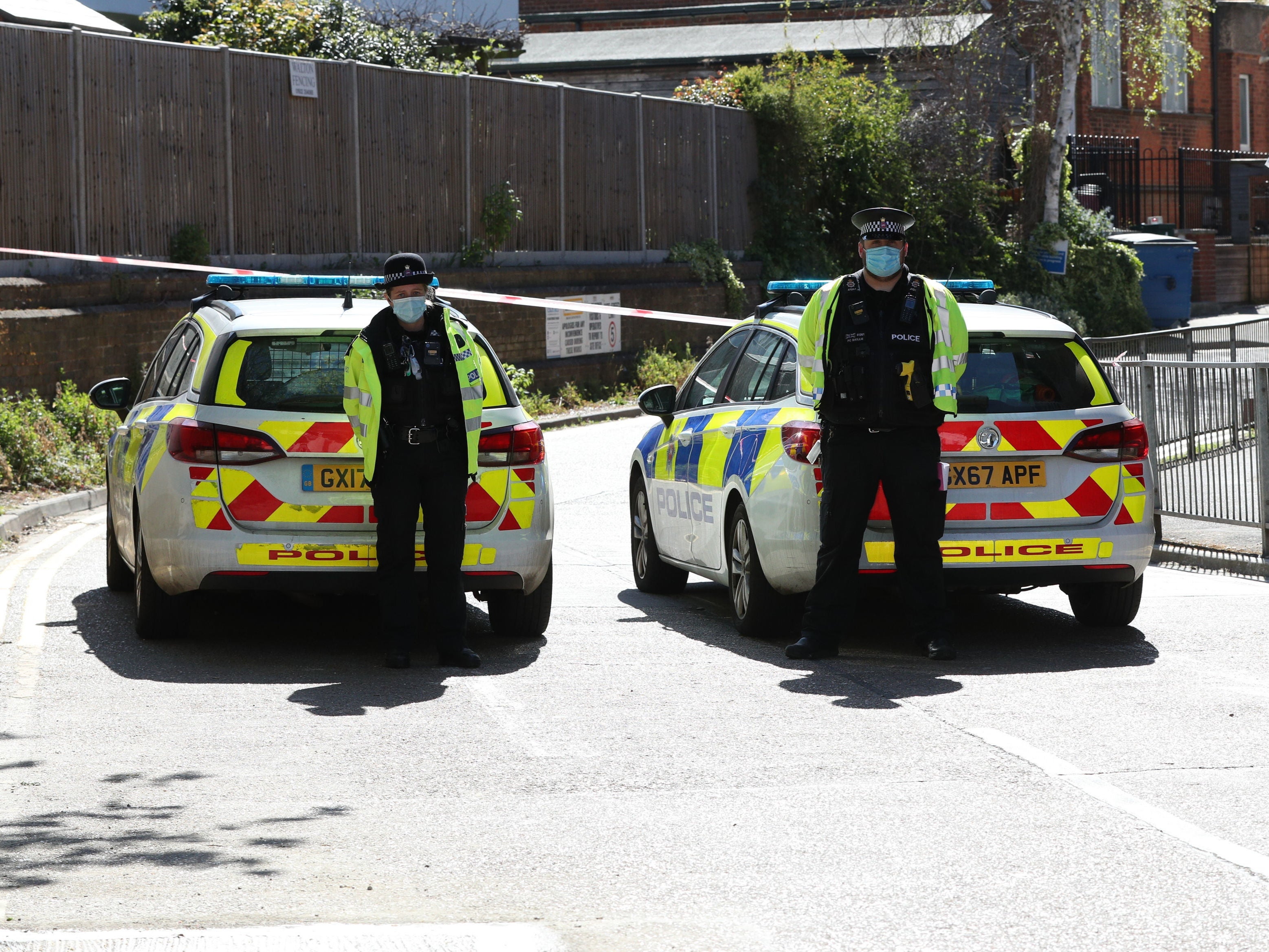 A man has died and another was airlifted to hospital after a car was reportedly driven at them in Walton-on-Thames, Surrey