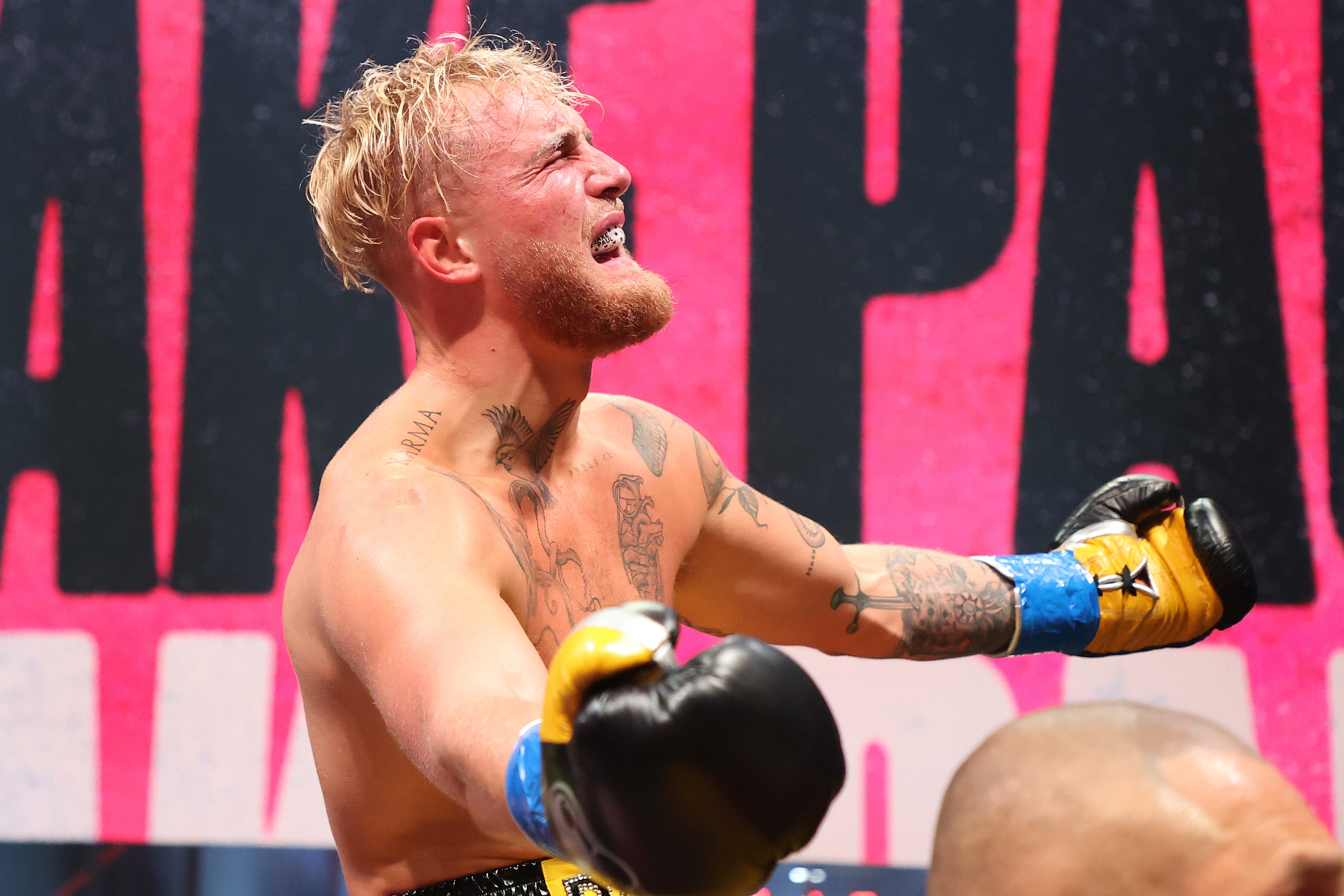 Jake Paul celebrates after defeating Ben Askren in their cruiserweight bout during Triller Fight Club at Mercedes-Benz Stadium on April 17, 2021 in Atlanta, Georgia.