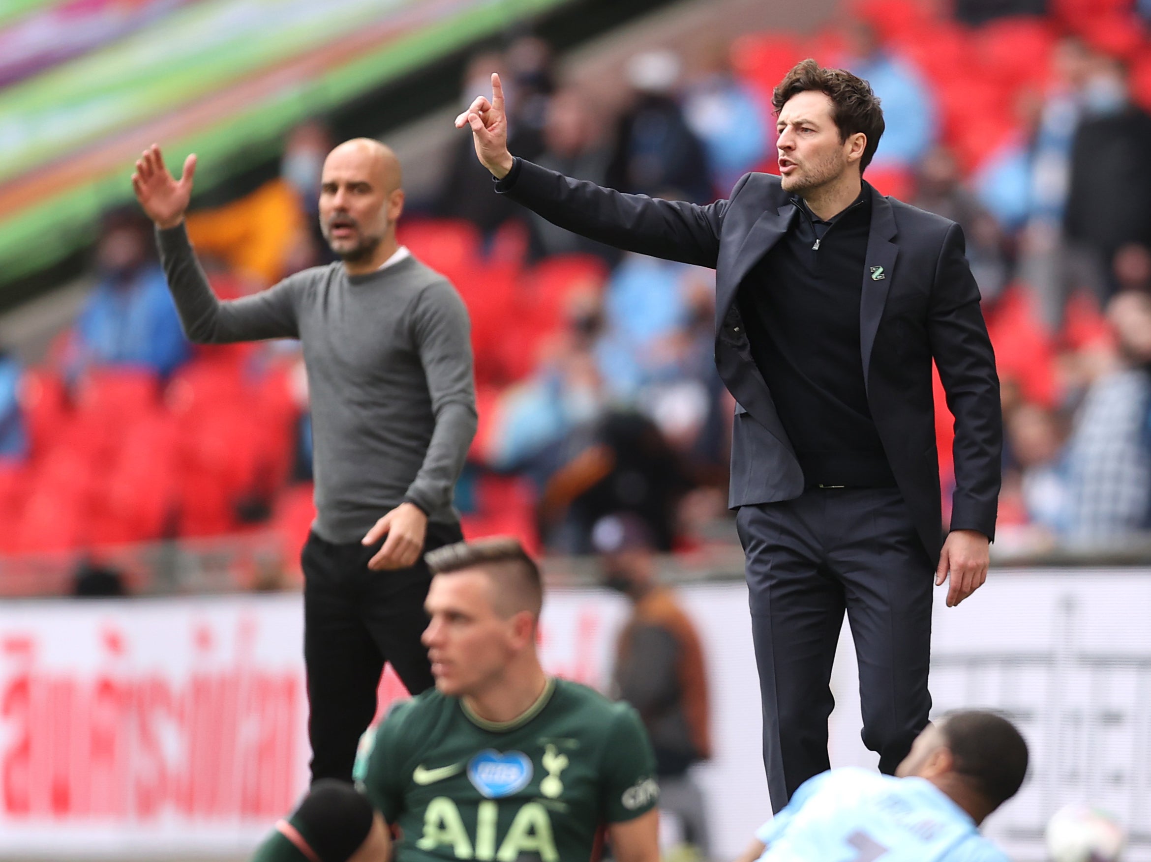 Ryan Mason (right) and Manchester City coach Pep Guardiola