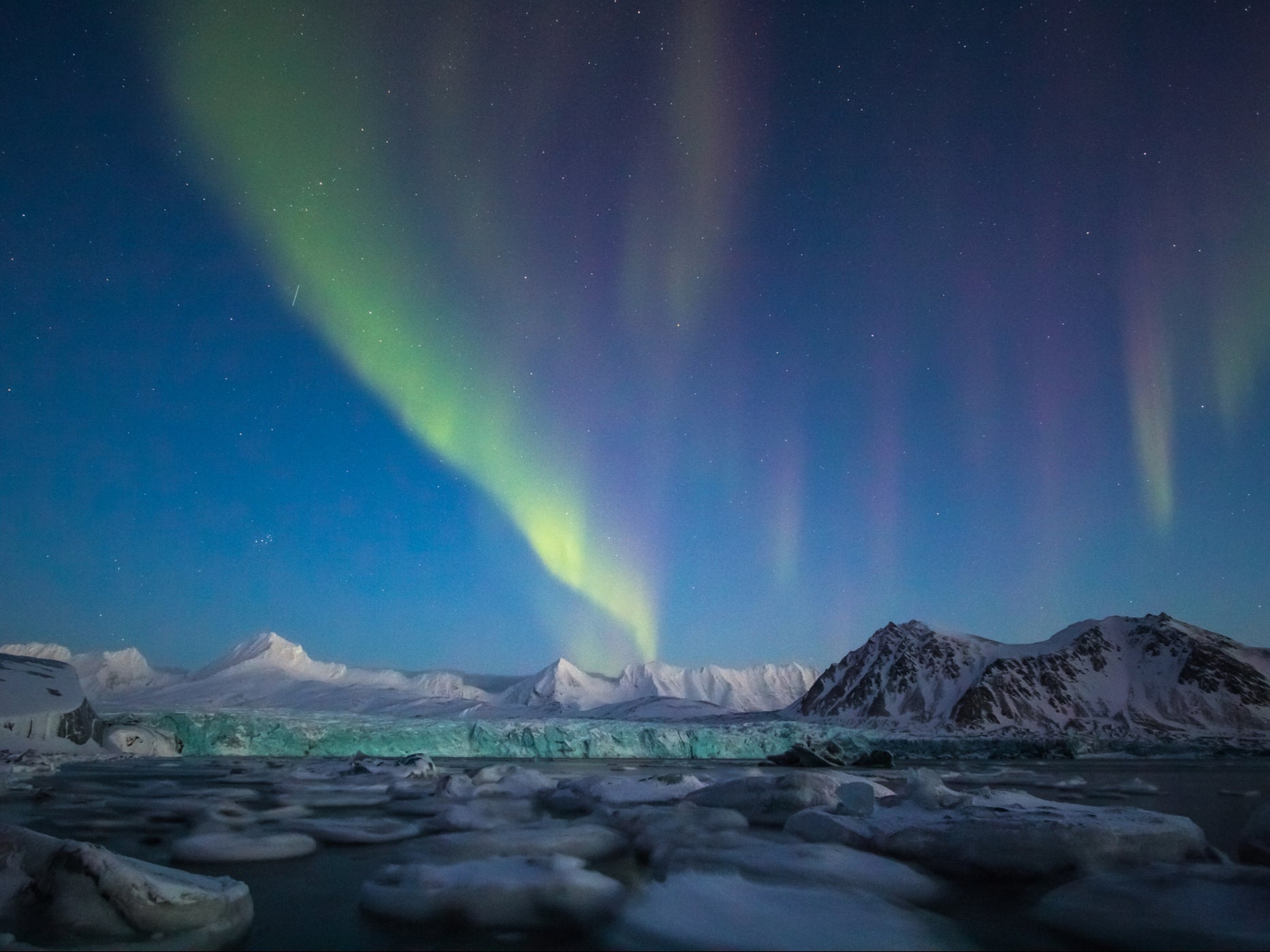 Melting glaciers, such as this one in south Spitsbergen, are impacting water distribution and the location of the North Pole, scientists say