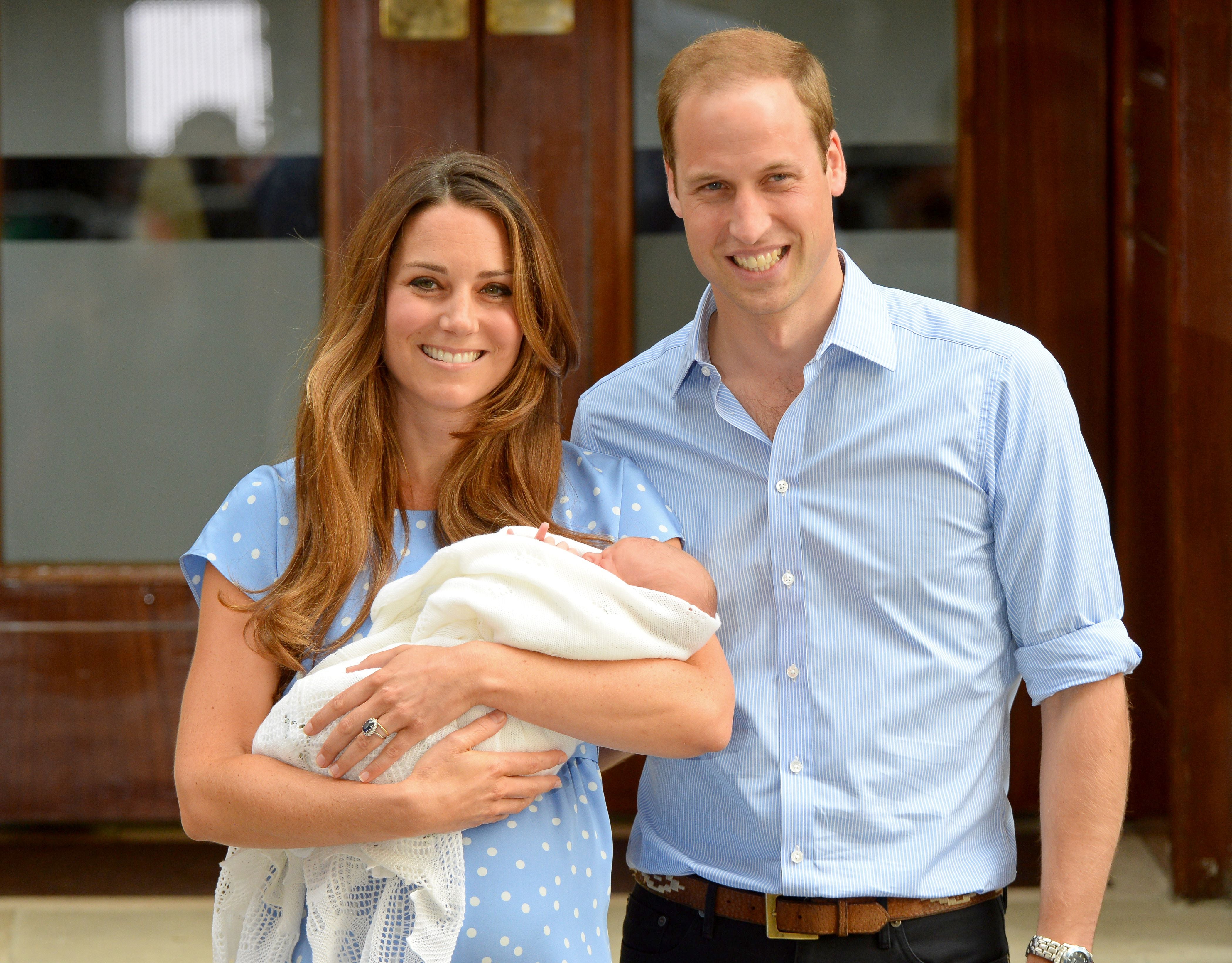 Kate and William leave St Mary’s hospital with newborn son Prince George on 23 July 2013