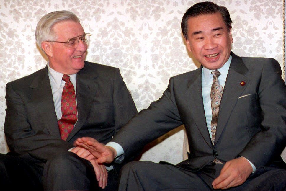 With Japanese politician Tsutomu Hata in 1995