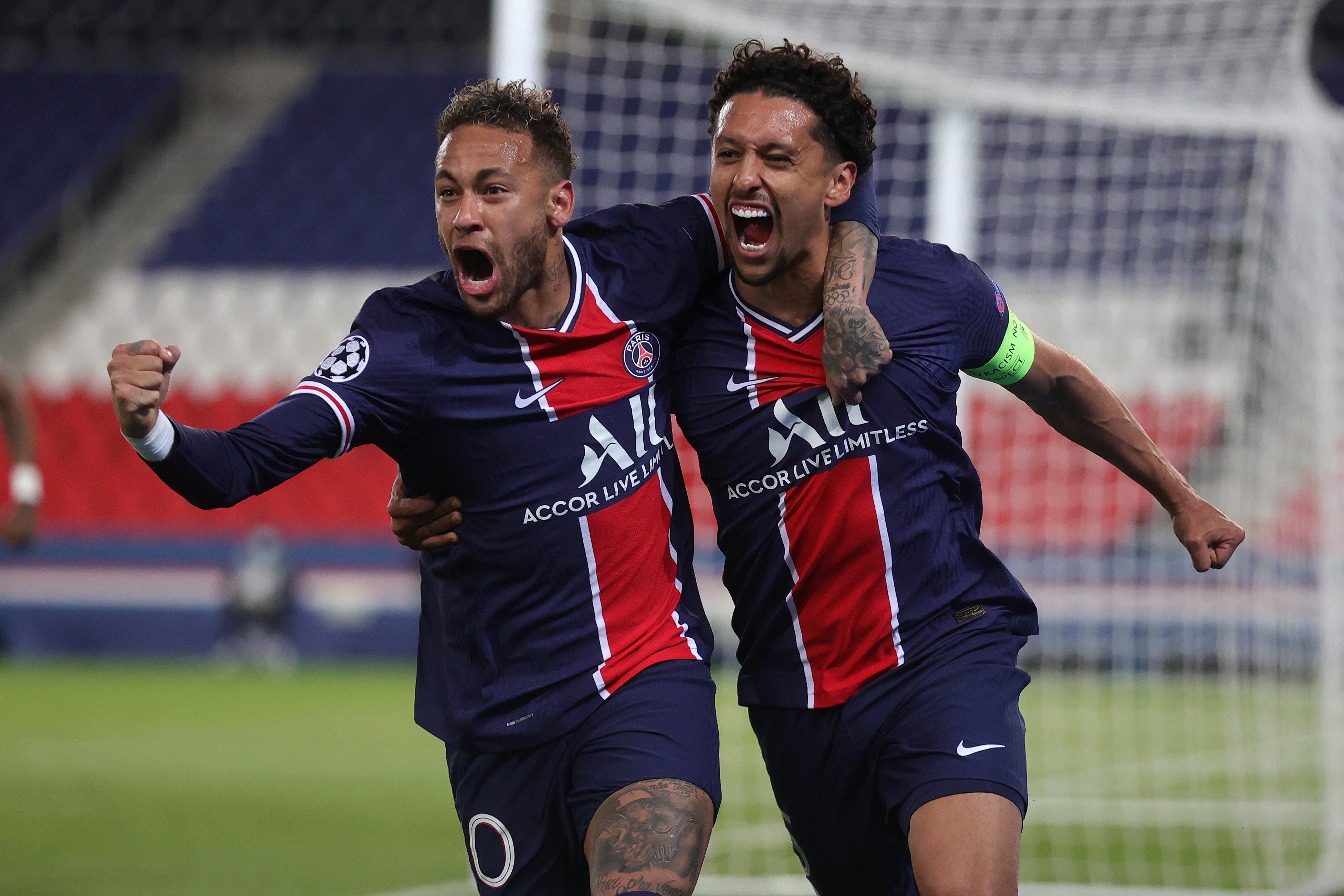 Neymar celebrates with goalscorer Marquinhos